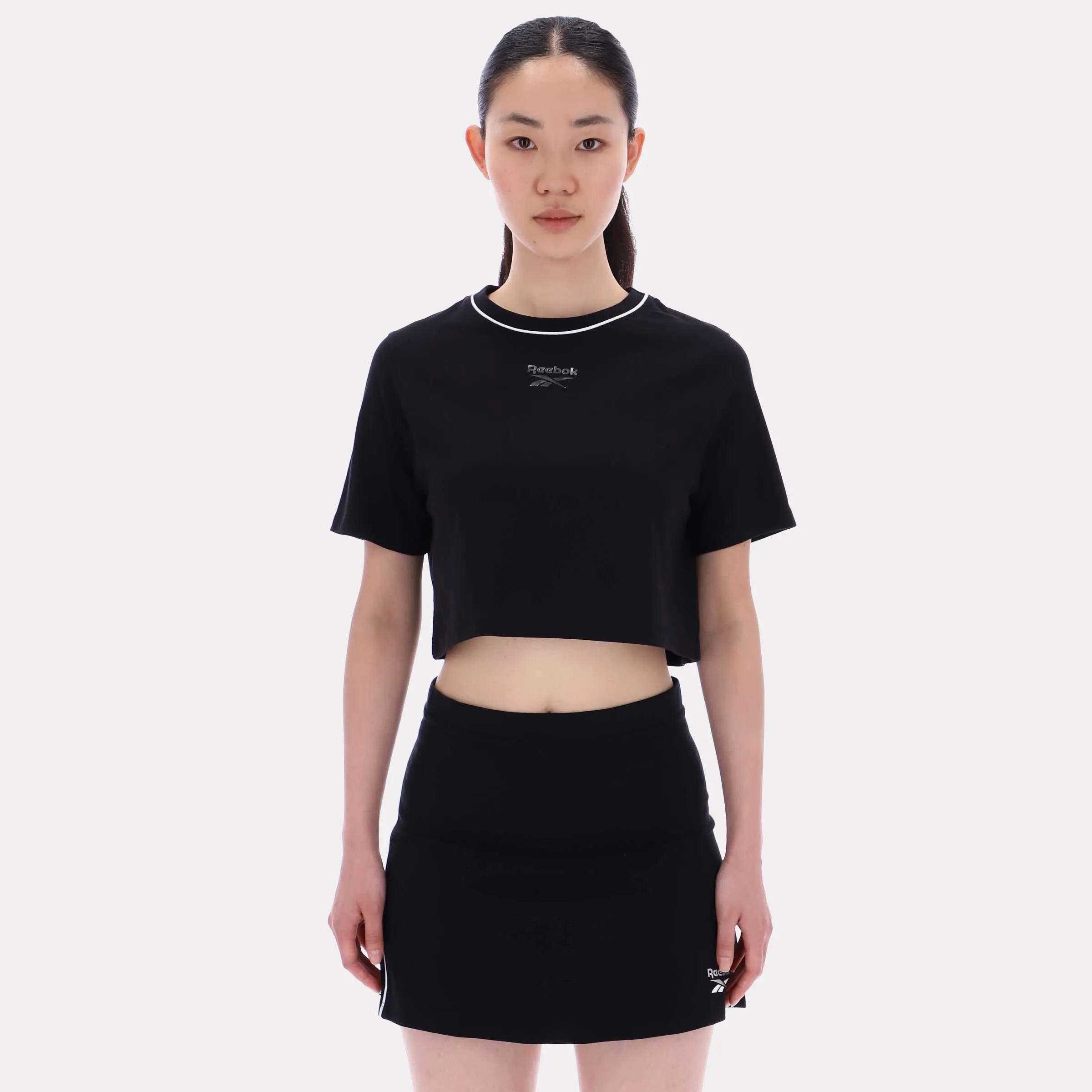 Reebok Apparel Women Cropped Small Logo T-Shirt BLACK sold by Reebok