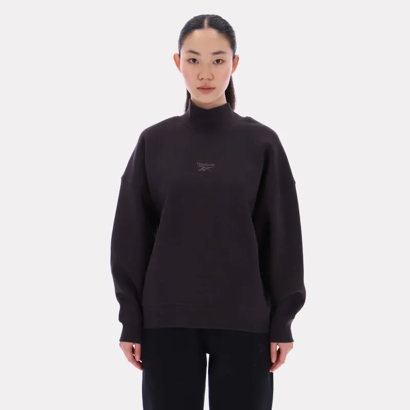 Reebok Apparel Women Longline Roll Neck Sweatshirt WASHED BLACK sold by Reebok