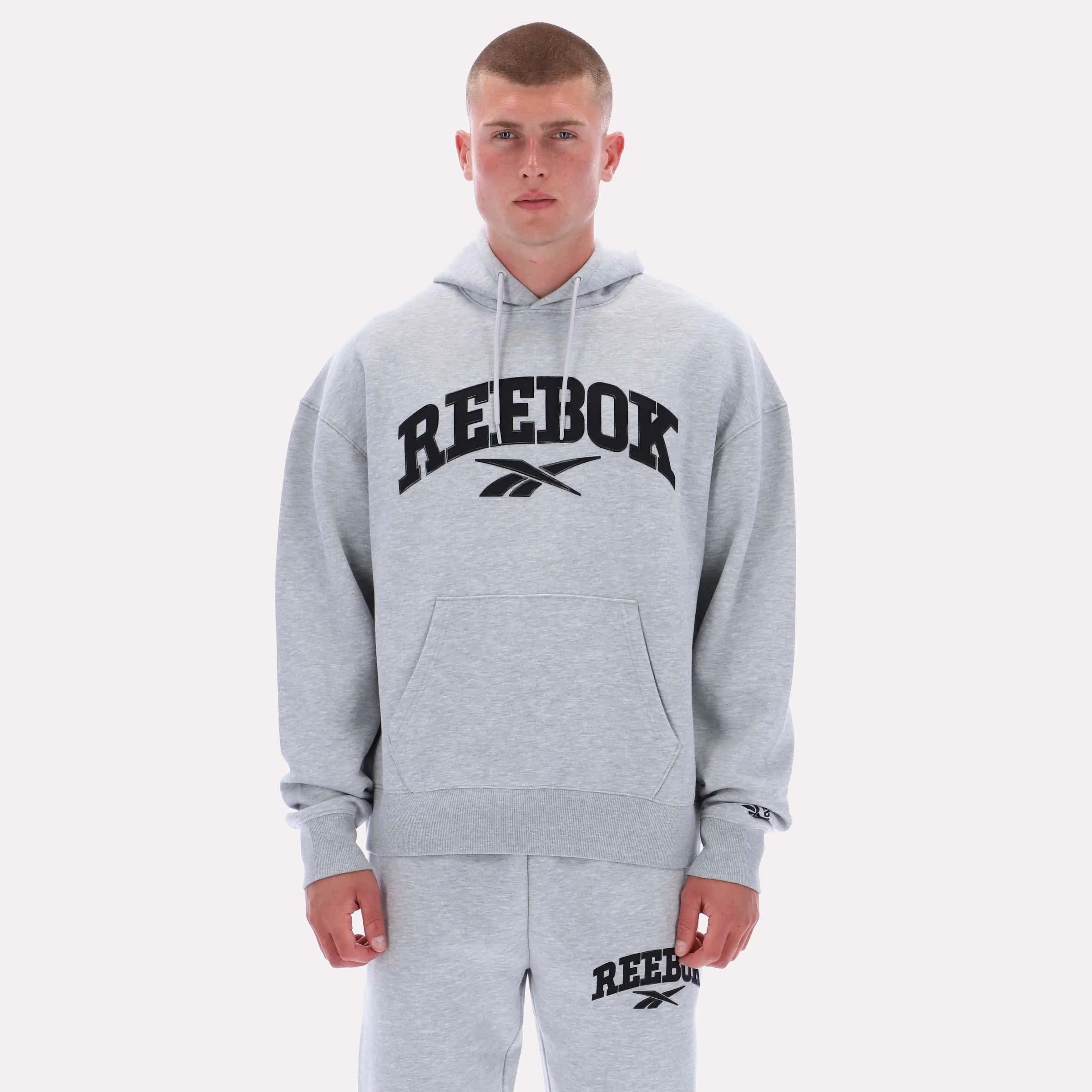 Reebok Apparel Men Classics Varsity Logo Hoodie LIGHT GREY MARL sold by Reebok