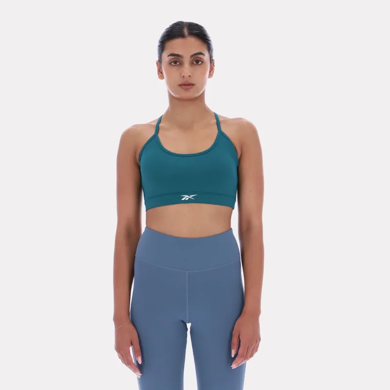 Reebok Apparel Women Everyday Strappy Sports Bra RETRO TEAL made by Reebok