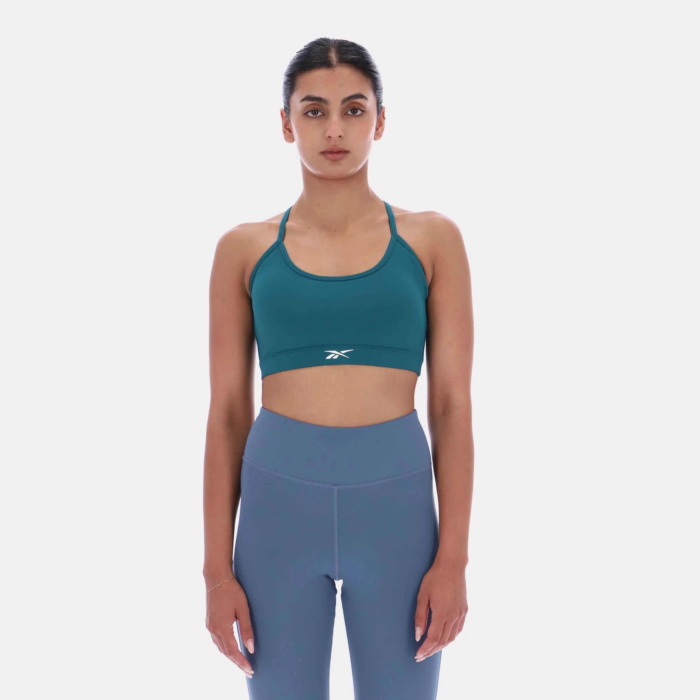 Reebok Apparel Women Everyday Strappy Sports Bra RETRO TEAL sold by Reebok