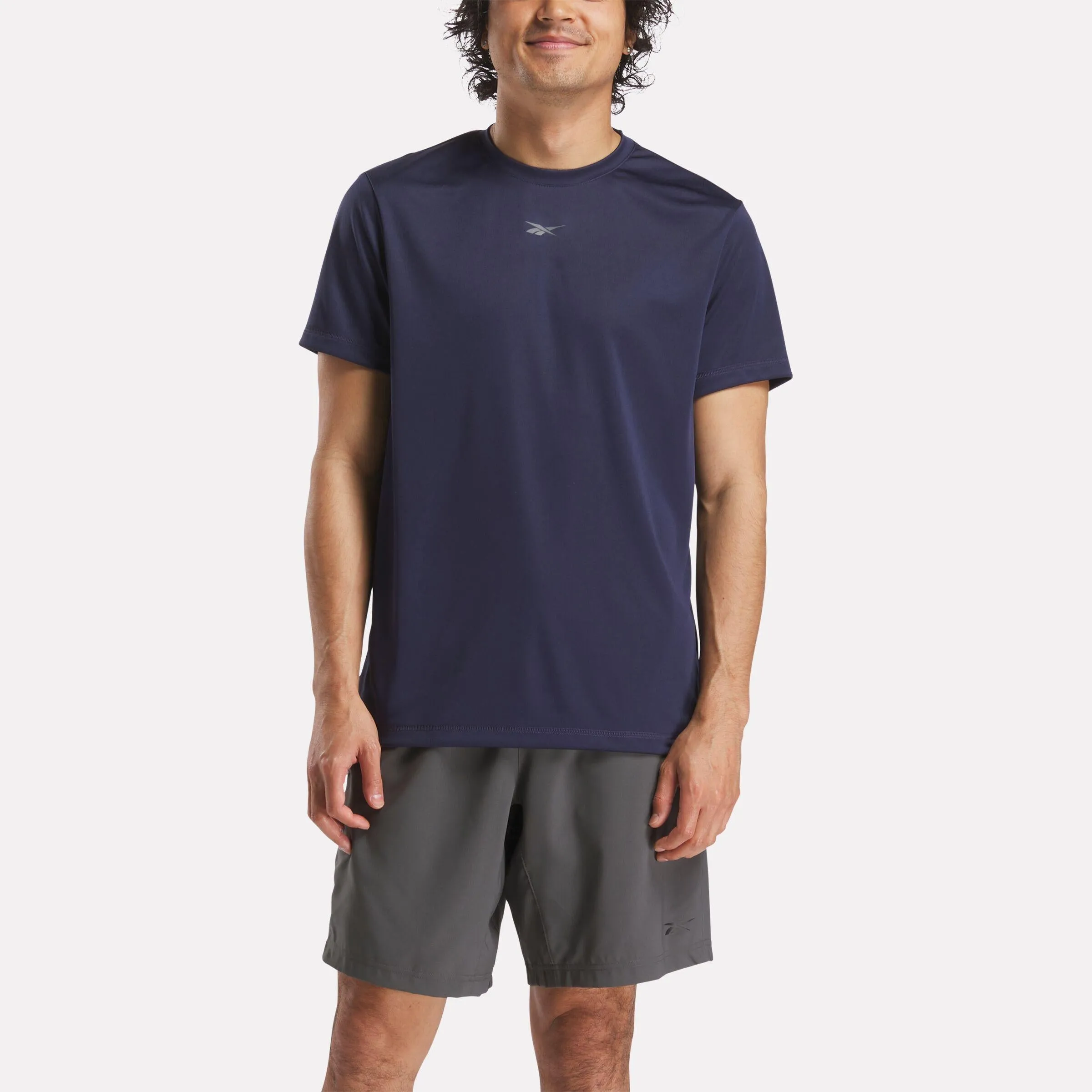 Reebok Apparel Men ID Train Tech Tee VECTOR NAVY sold by Reebok