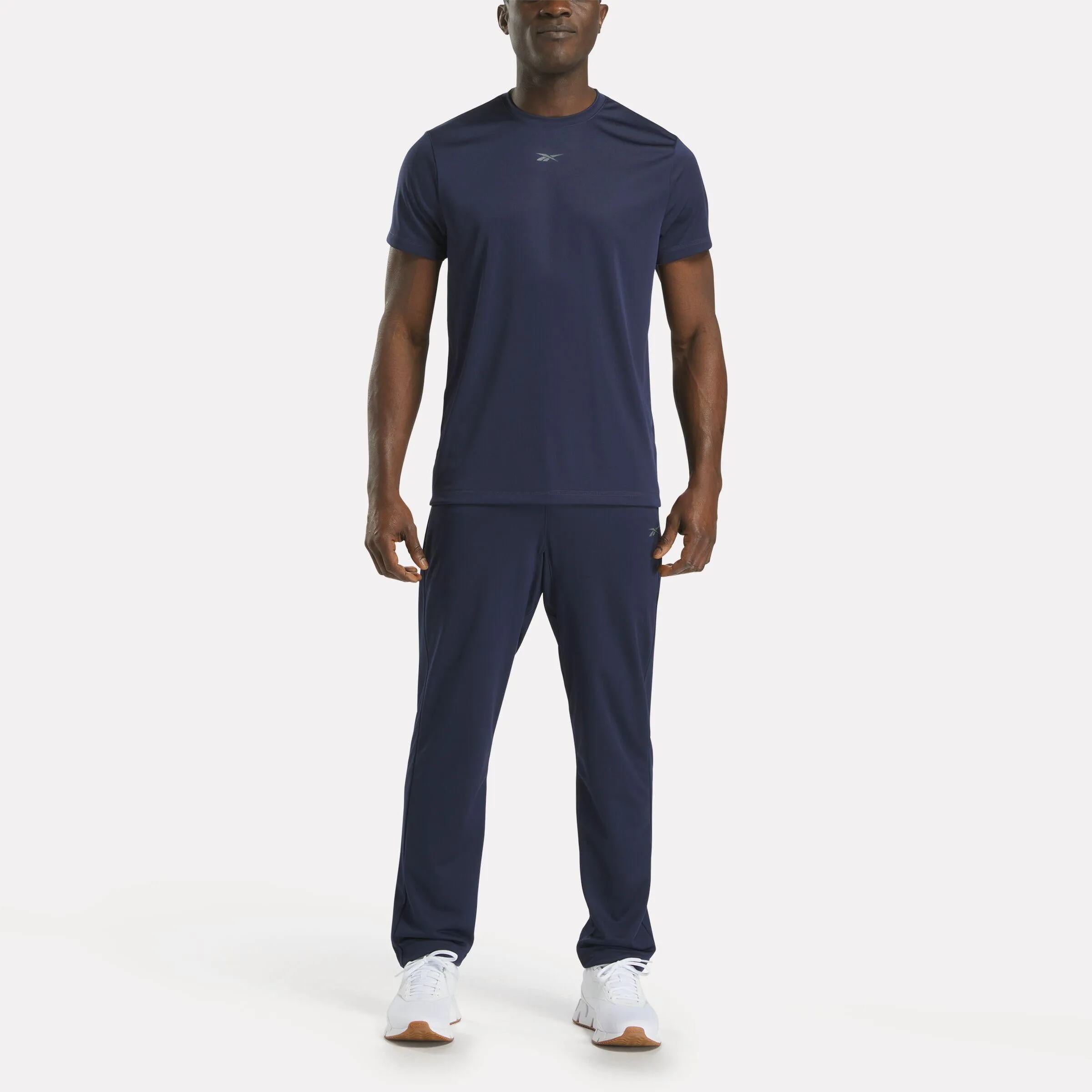 Reebok Apparel Men ID Train Pants VECTOR NAVY sold by Reebok