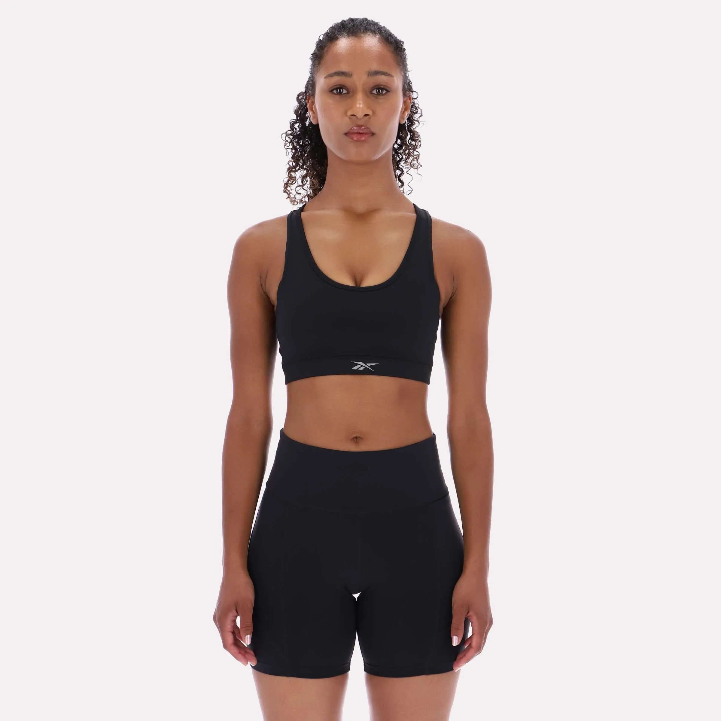 Reebok Apparel Women RBK-DRY Motion Sports Bra BLACK sold by Reebok