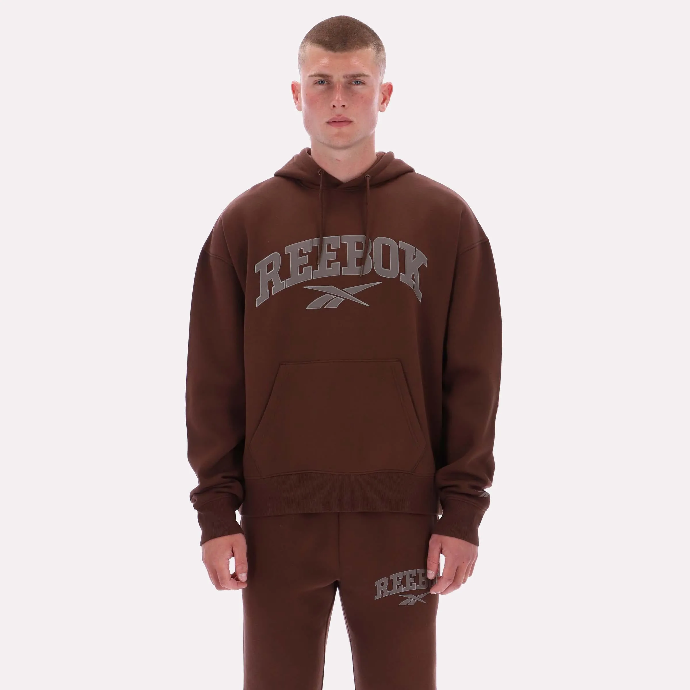 Reebok Apparel Men Varsity Hoodie CAMPUS BROWN sold by Reebok