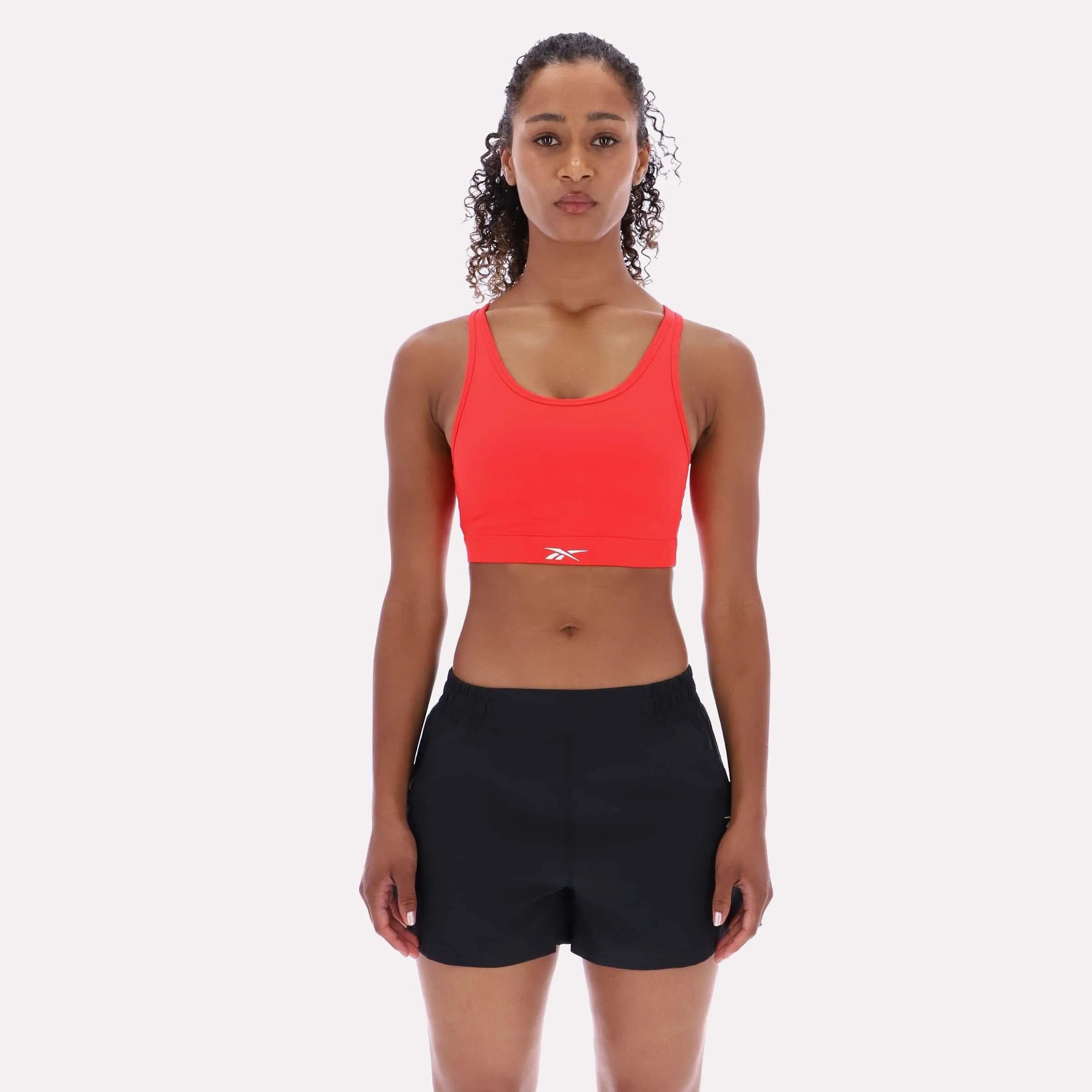Reebok Apparel Women Core High-Impact Bra ENERGY RED sold by Reebok