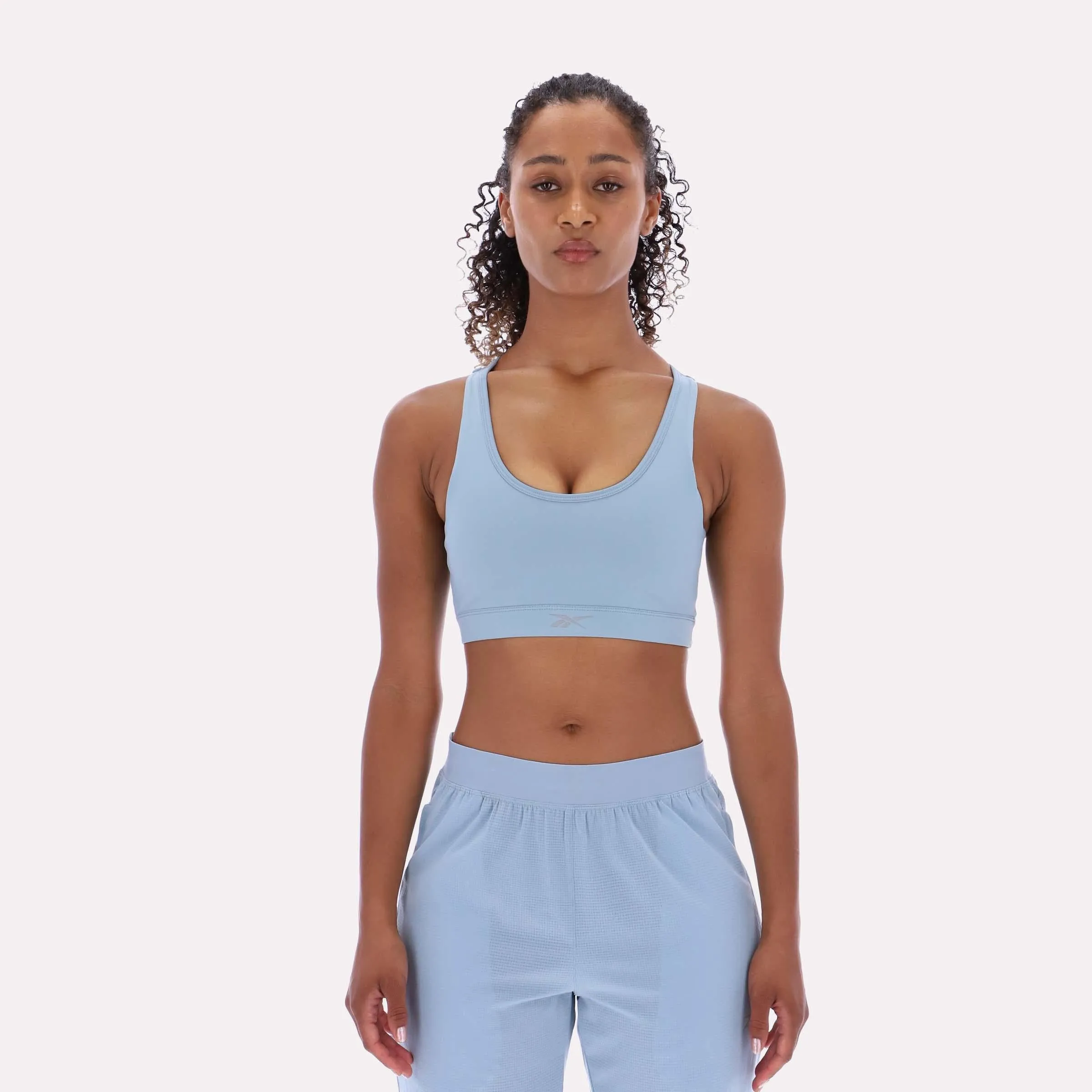 Reebok Apparel Women RBK-DRY Motion Sports Bra LEISURE BLUE sold by Reebok