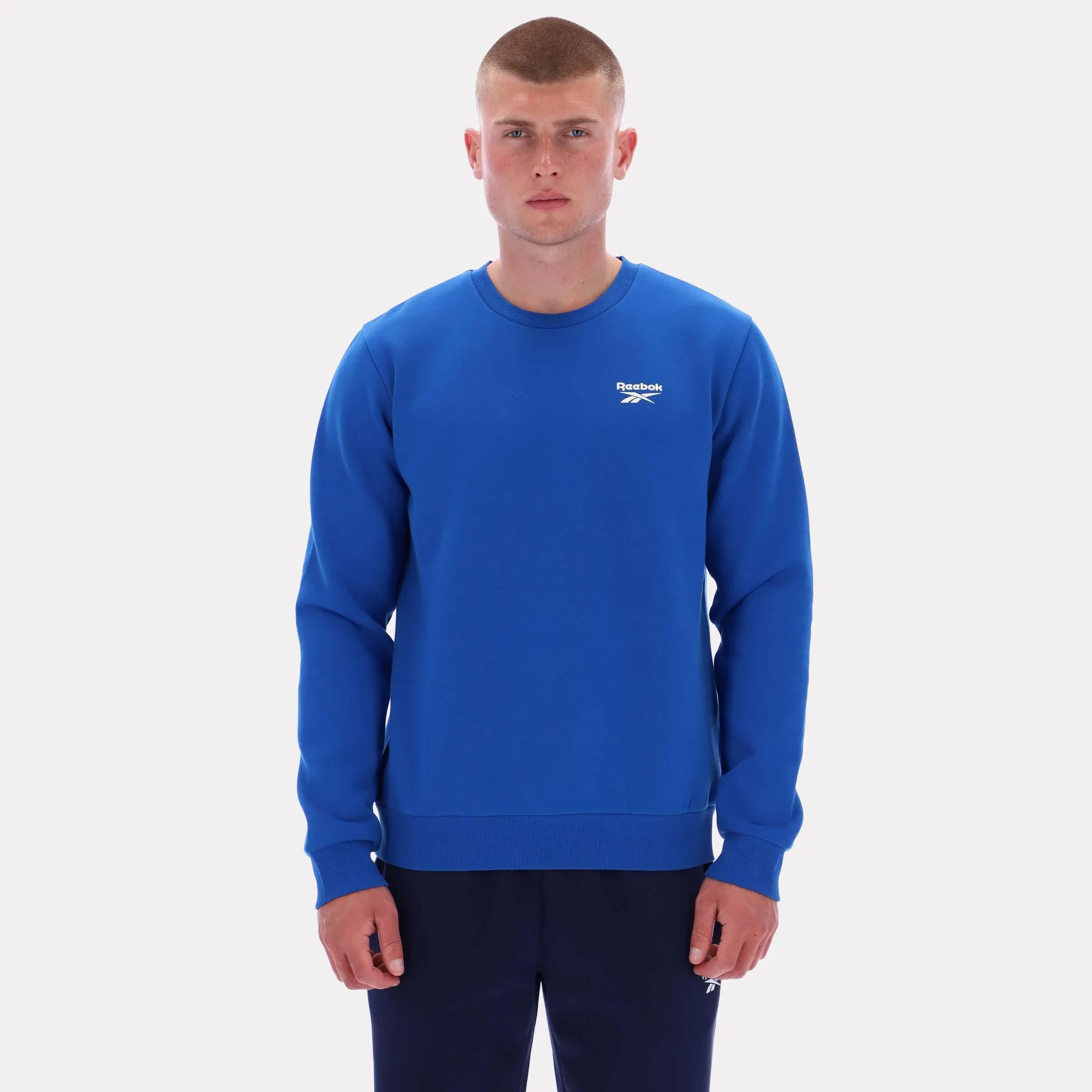 Reebok Apparel Men Essential Logo Crewneck Sweatshirt VECTOR BLUE sold by Reebok