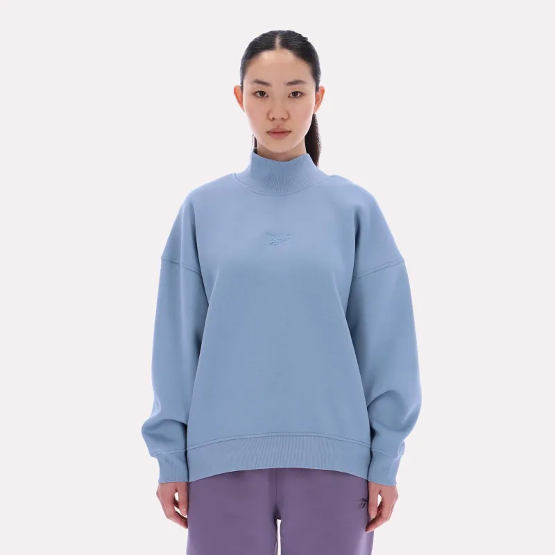 Reebok Apparel Women Oversized Roll Neck Sweatshirt LEISURE BLUE sold by Reebok