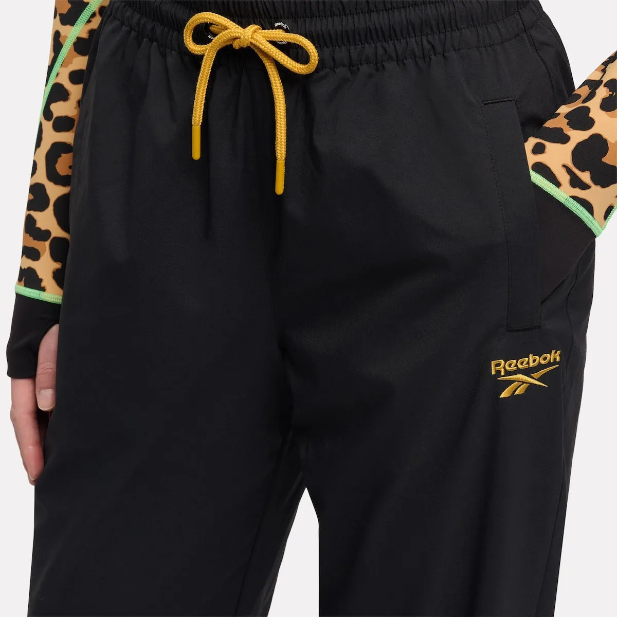 REEBOK APPAREL WOMEN Animal Print Vector Track Pants BLACK sold by Reebok product image thumbnail 4