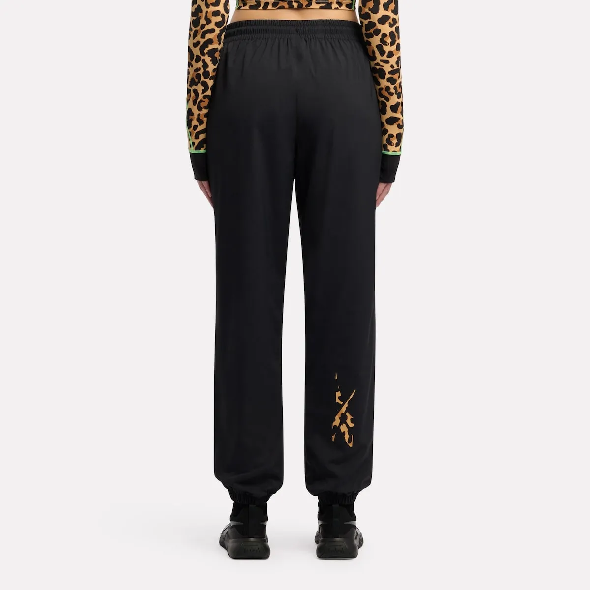 REEBOK APPAREL WOMEN Animal Print Vector Track Pants BLACK sold by Reebok product image thumbnail 3
