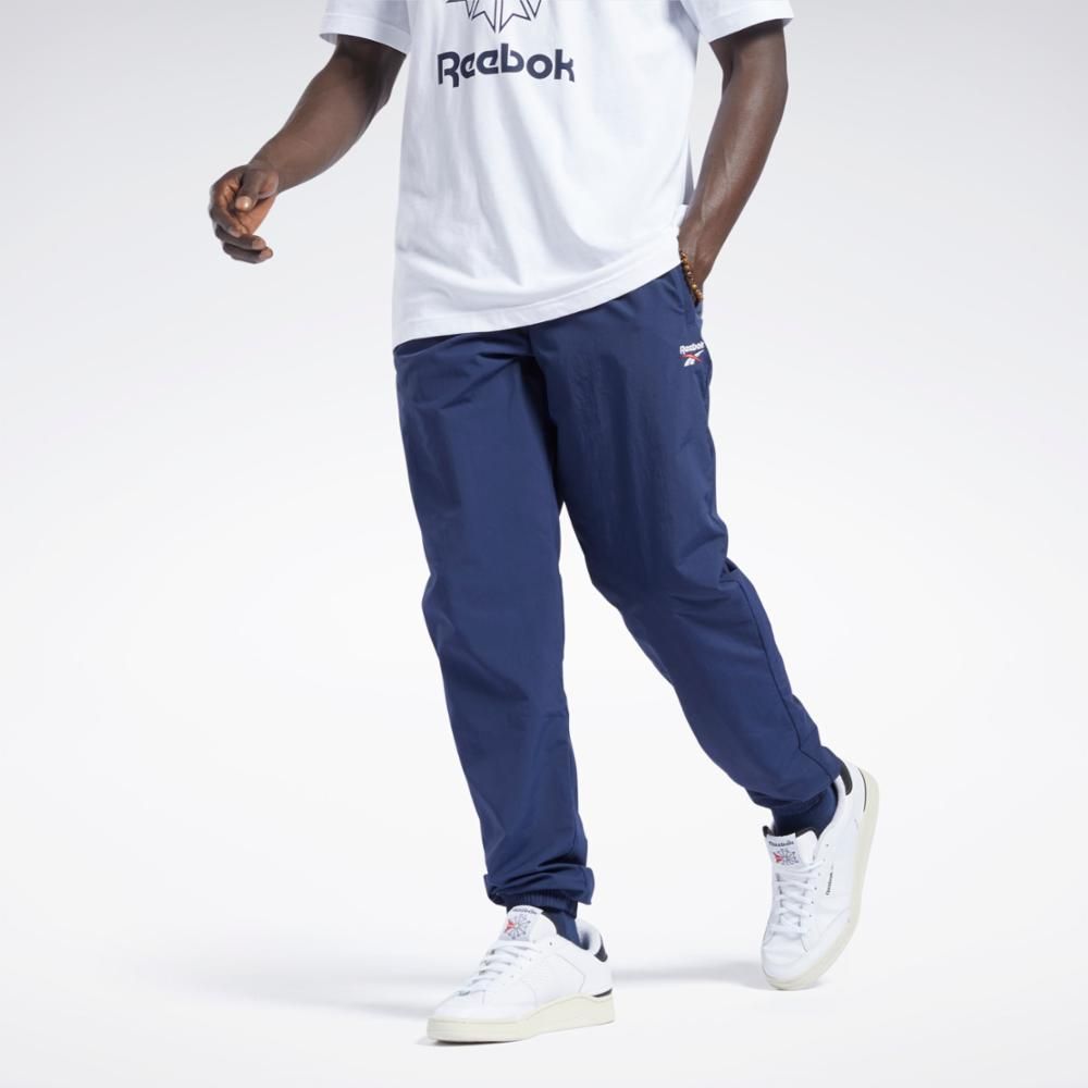 Reebok Apparel Men Classics Vector Tracksuit Bottoms VECNAV sold by Reebok
