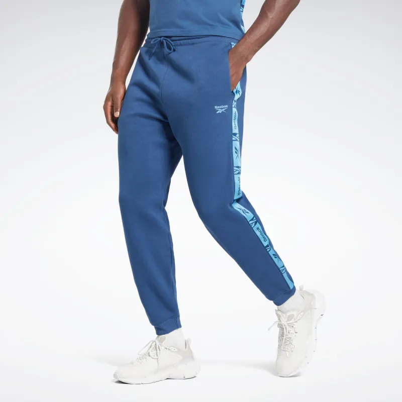 Reebok Apparel Men Training Essentials Tape Joggers Batblu sold by Reebok