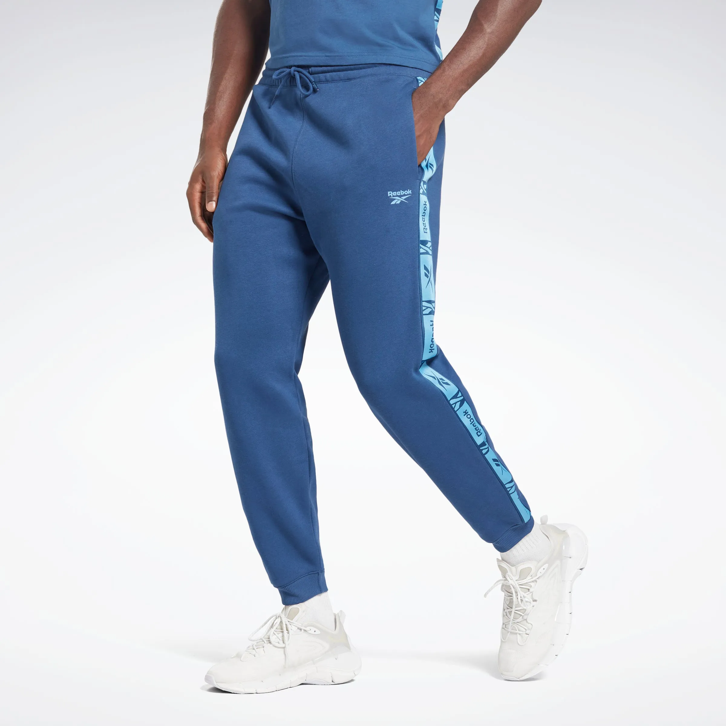 Reebok Apparel Men Training Essentials Tape Joggers Batblu sold by Reebok
