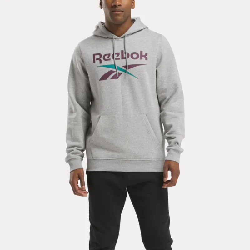 Reebok Apparel Men Reebok Identity Fleece Stacked Logo Pullover Hoodie MGREYH/MIDNIGHT PLUM sold by Reebok