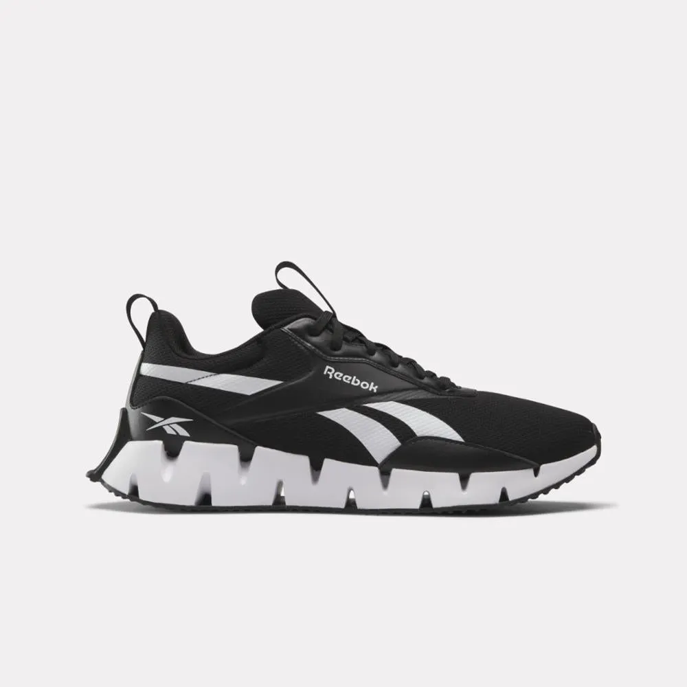 Reebok Footwear Men Zig Dynamica STR Shoes CBLACK/FTWWHT/CBLACK sold by Reebok