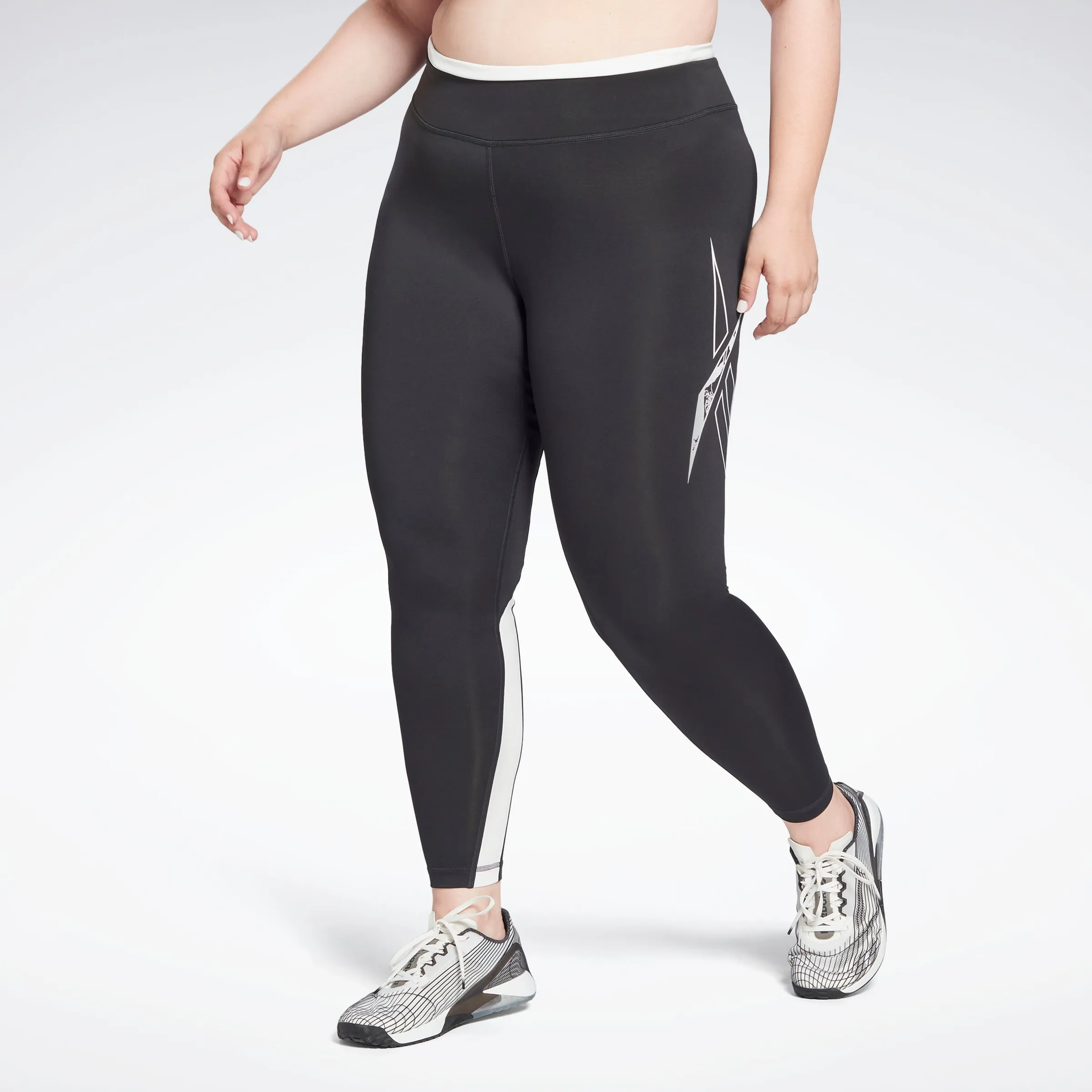 Reebok Apparel Women Workout Ready Vector Leggings (Plus Size) Nghblk sold by Reebok
