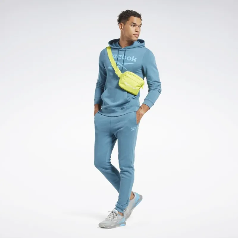 Reebok Apparel Men Reebok Identity French Terry Vector Pullover Hoodie STEBLU sold by Reebok