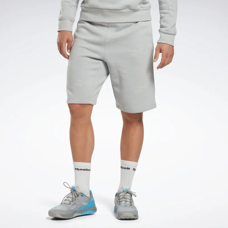 Reebok Apparel Men Reebok Identity Vector Fleece Shorts Pugry3 sold by Reebok