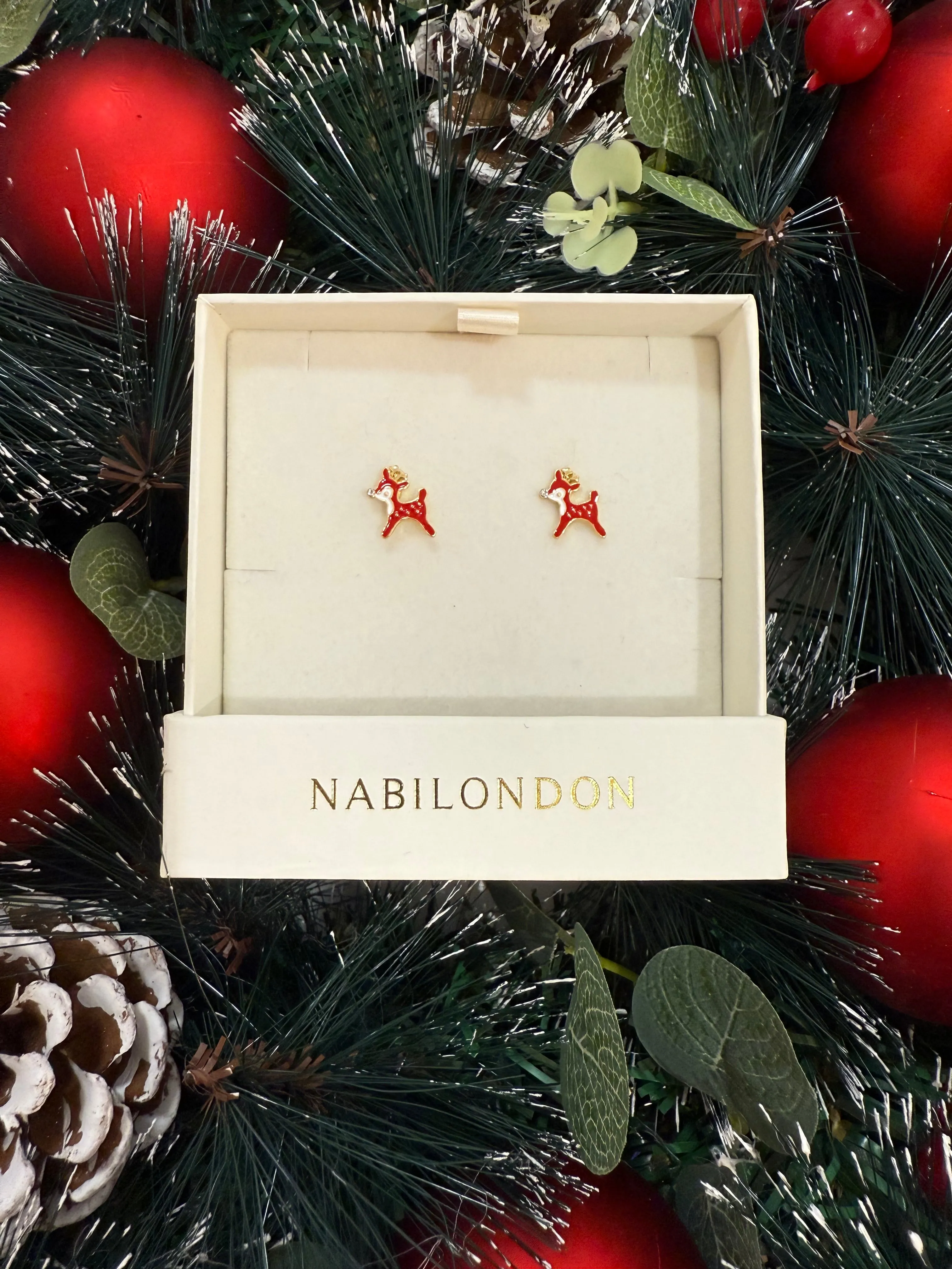 Christmas reindeer cubic earrings sold by NABI LONDON