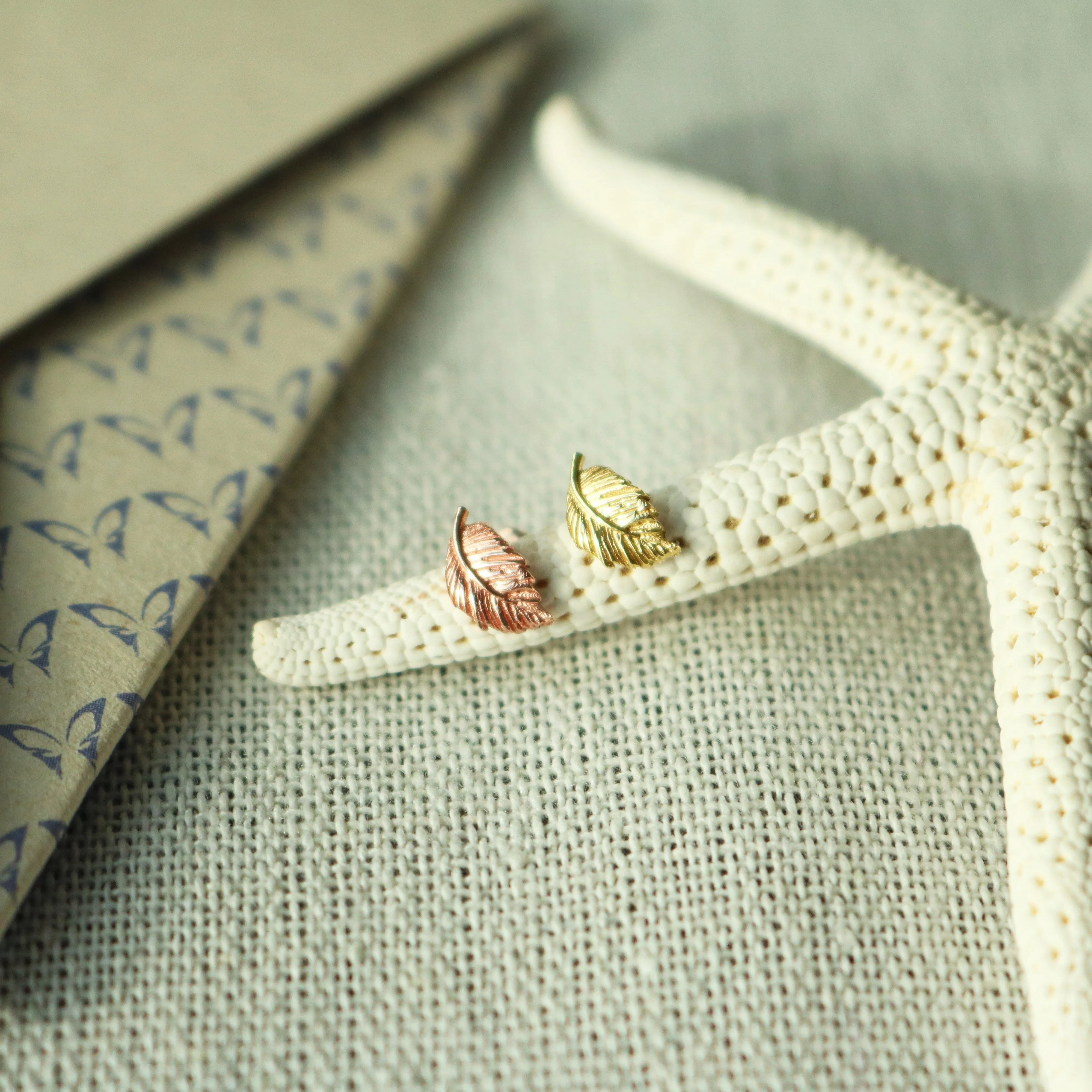 Leaf barbell sold by NABI LONDON