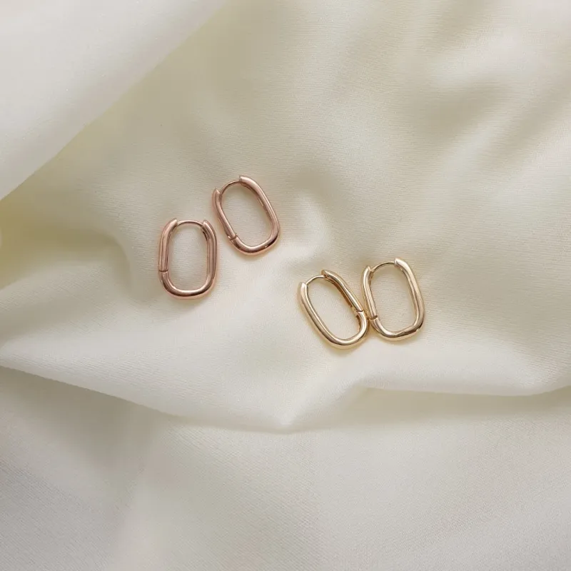 Bold one touch earrings sold by NABI LONDON