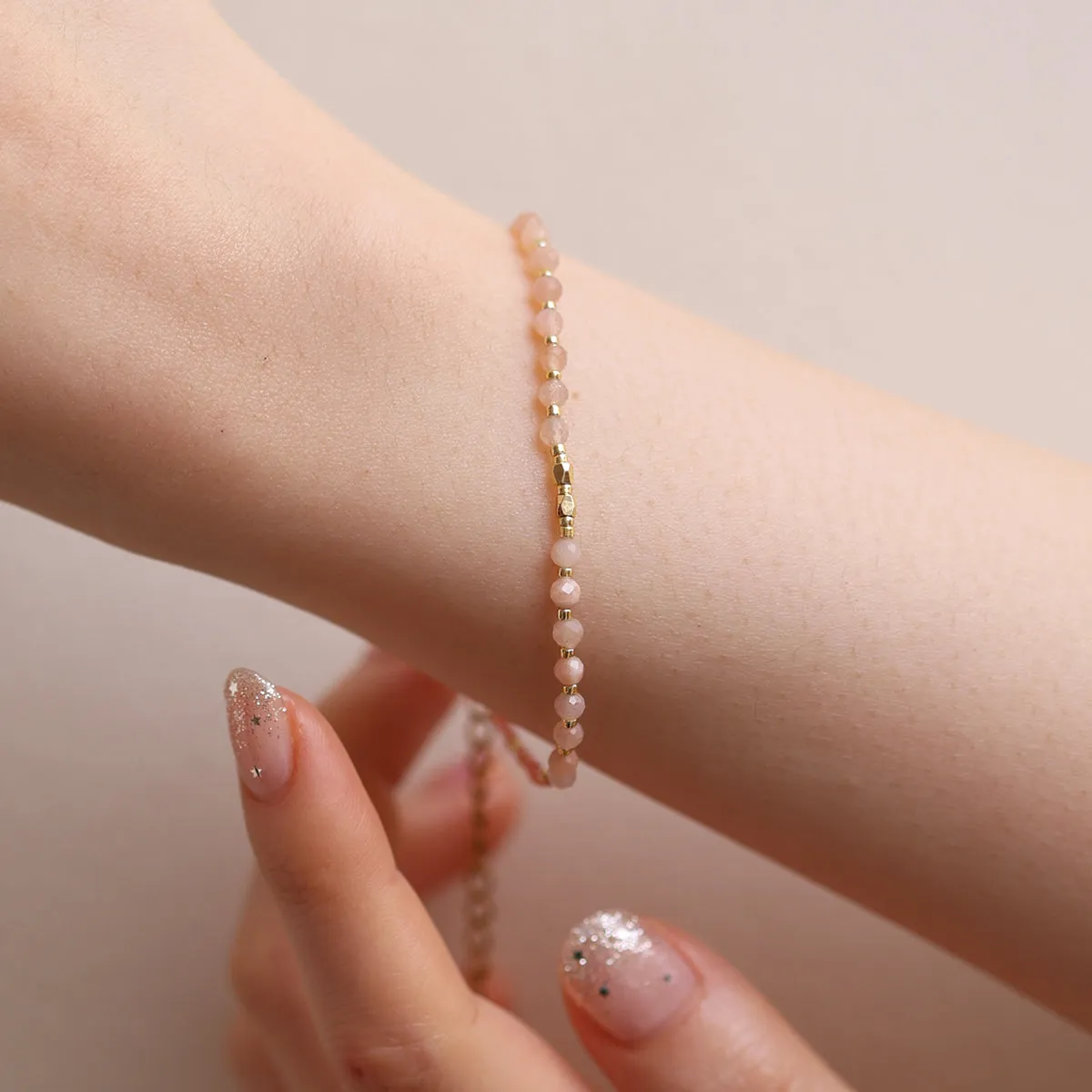 Rose quartz beaded bracelet sold by NABI LONDON