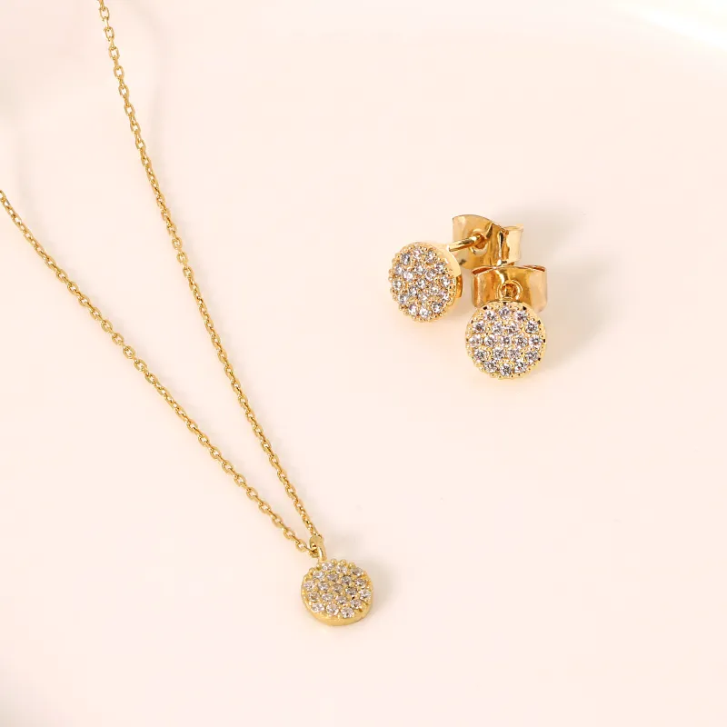 White Topaz Sparkle Set in Gold made by NABI LONDON