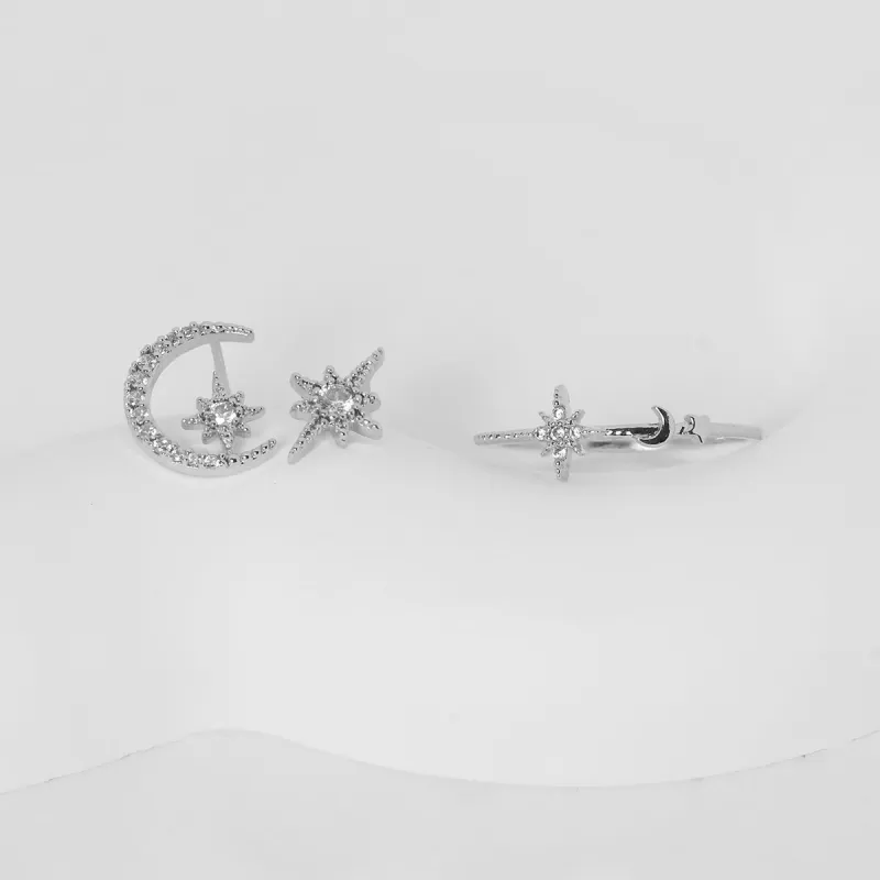 Moon and star set in Silver sold by NABI LONDON