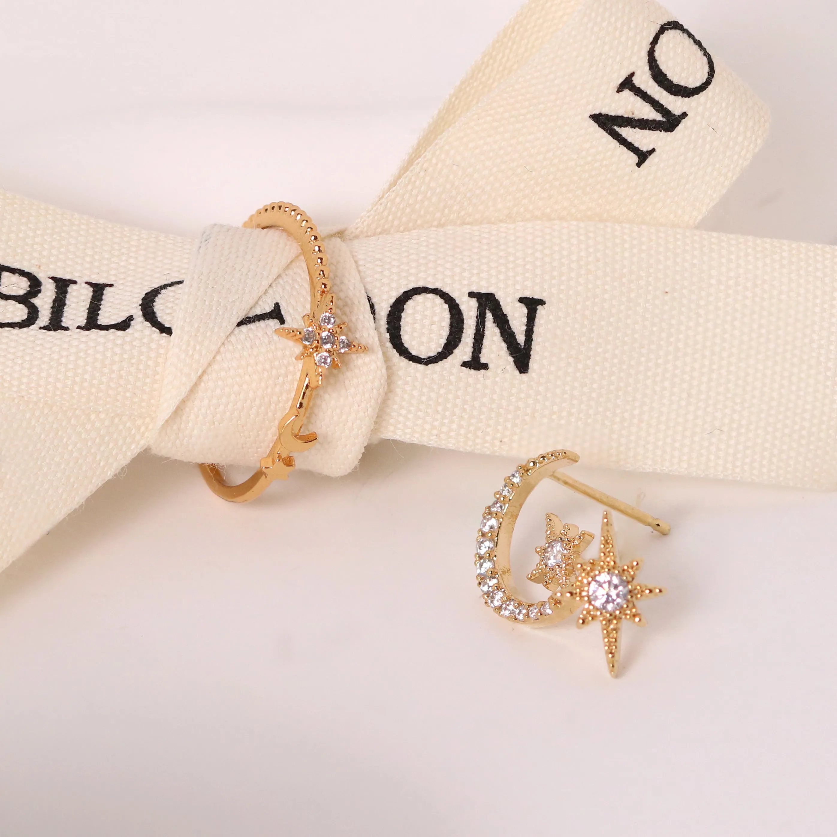 Moon and Star Set in Gold sold by NABI LONDON