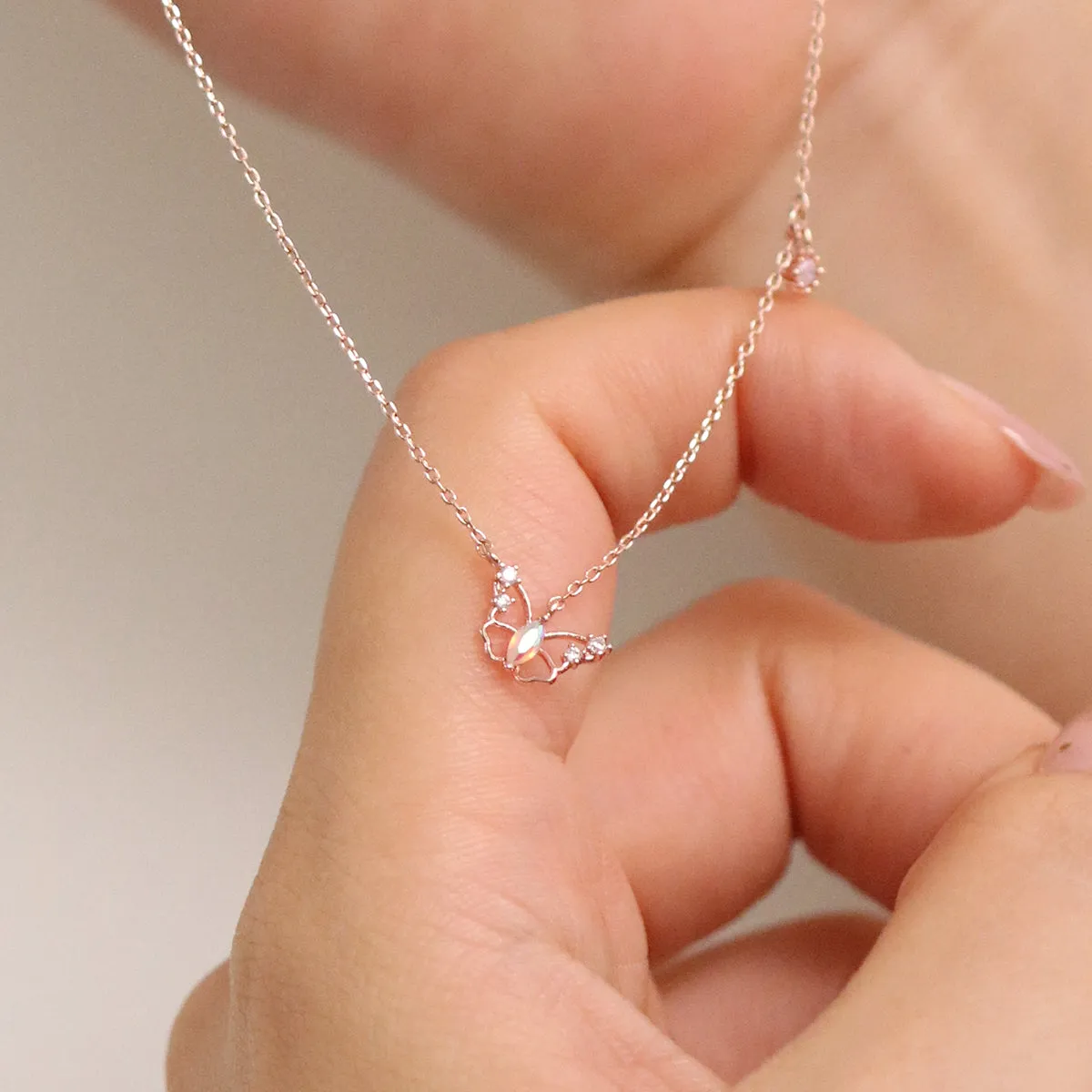 Butterfly cubic drop necklace sold by NABI LONDON product image thumbnail 4