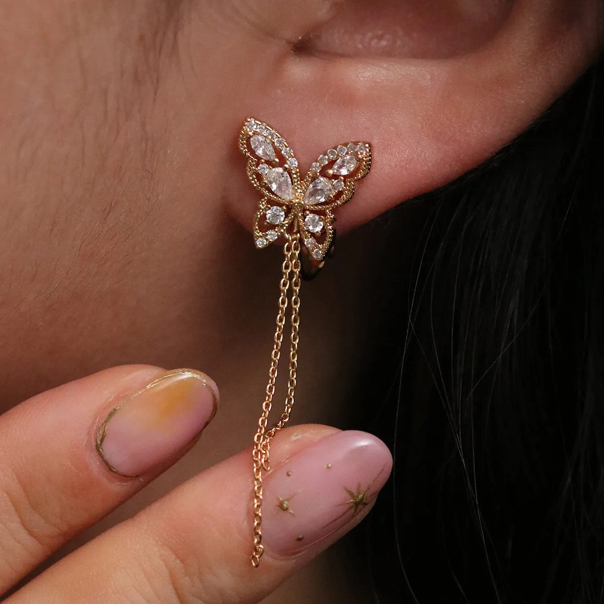 Butterfly Drop Clip On Earrings sold by NABI LONDON product image thumbnail 4