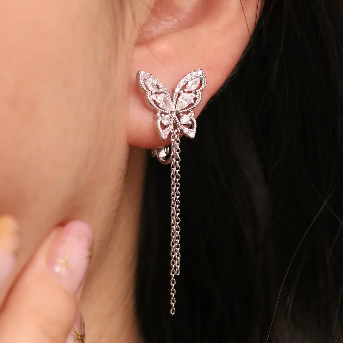 Butterfly Drop Clip On Earrings sold by NABI LONDON product image thumbnail 5