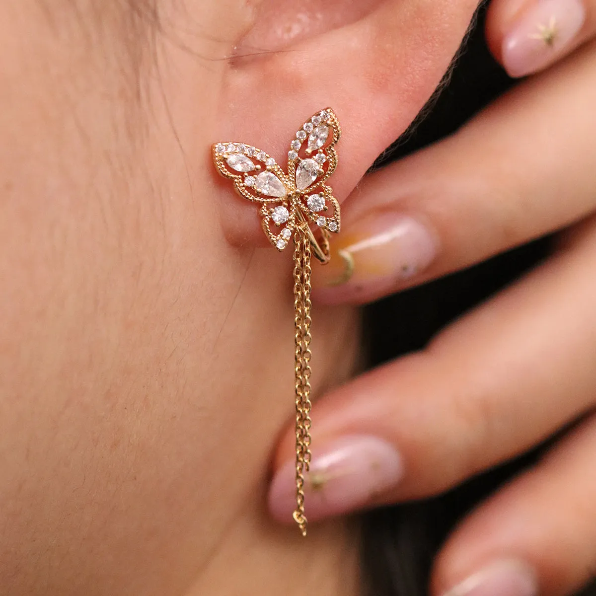 Butterfly Drop Clip On Earrings sold by NABI LONDON product image thumbnail 3