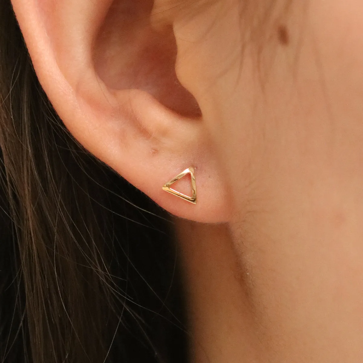 Simple triangle studs sold by NABI LONDON product image thumbnail 2