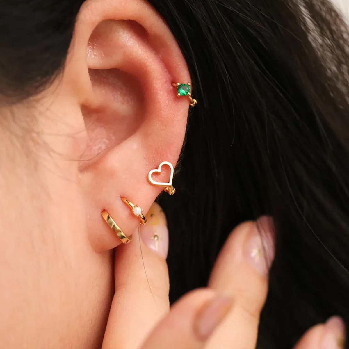 Opal Slim Huggie Earring sold by NABI LONDON product image thumbnail 4
