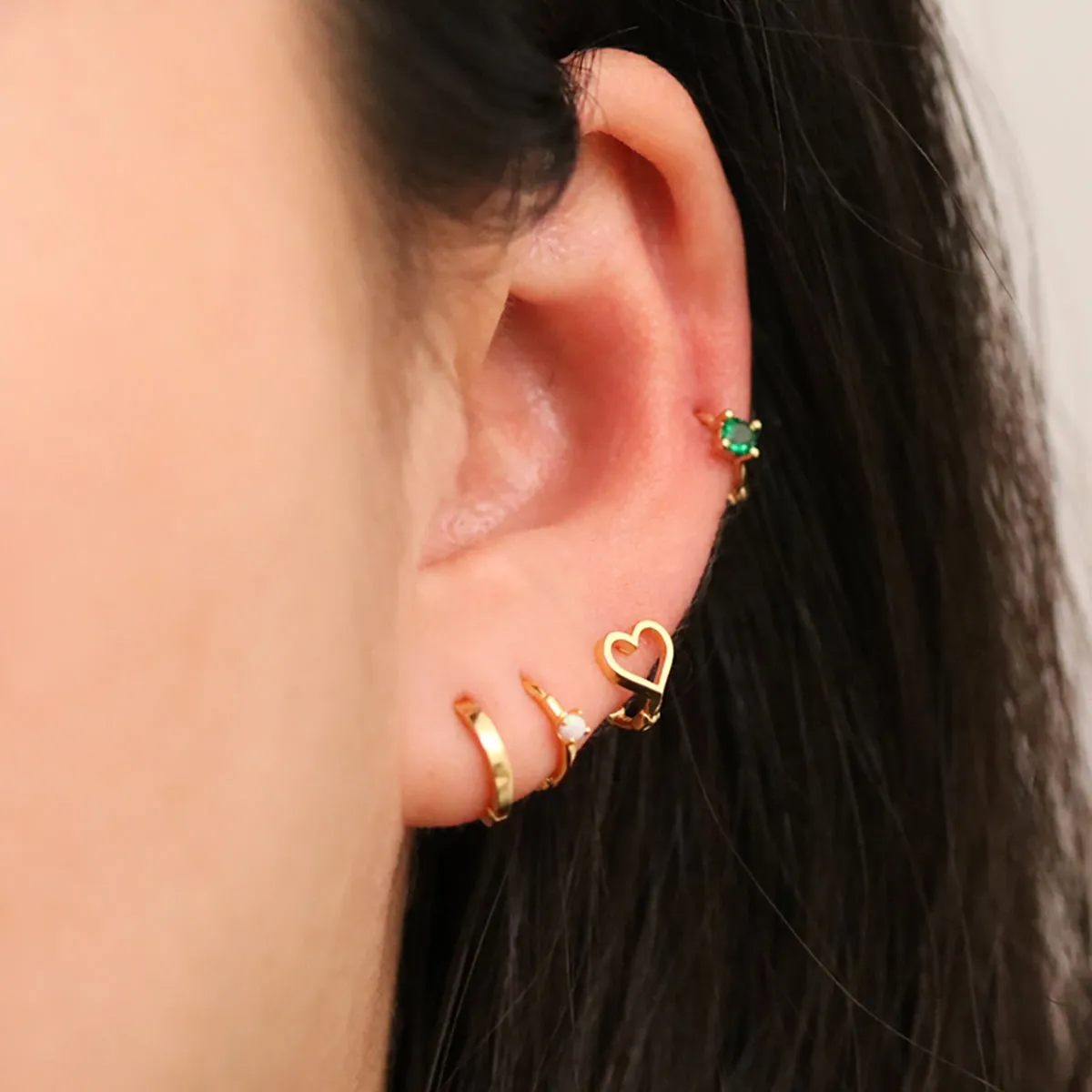 Opal Slim Huggie Earring sold by NABI LONDON product image thumbnail 3