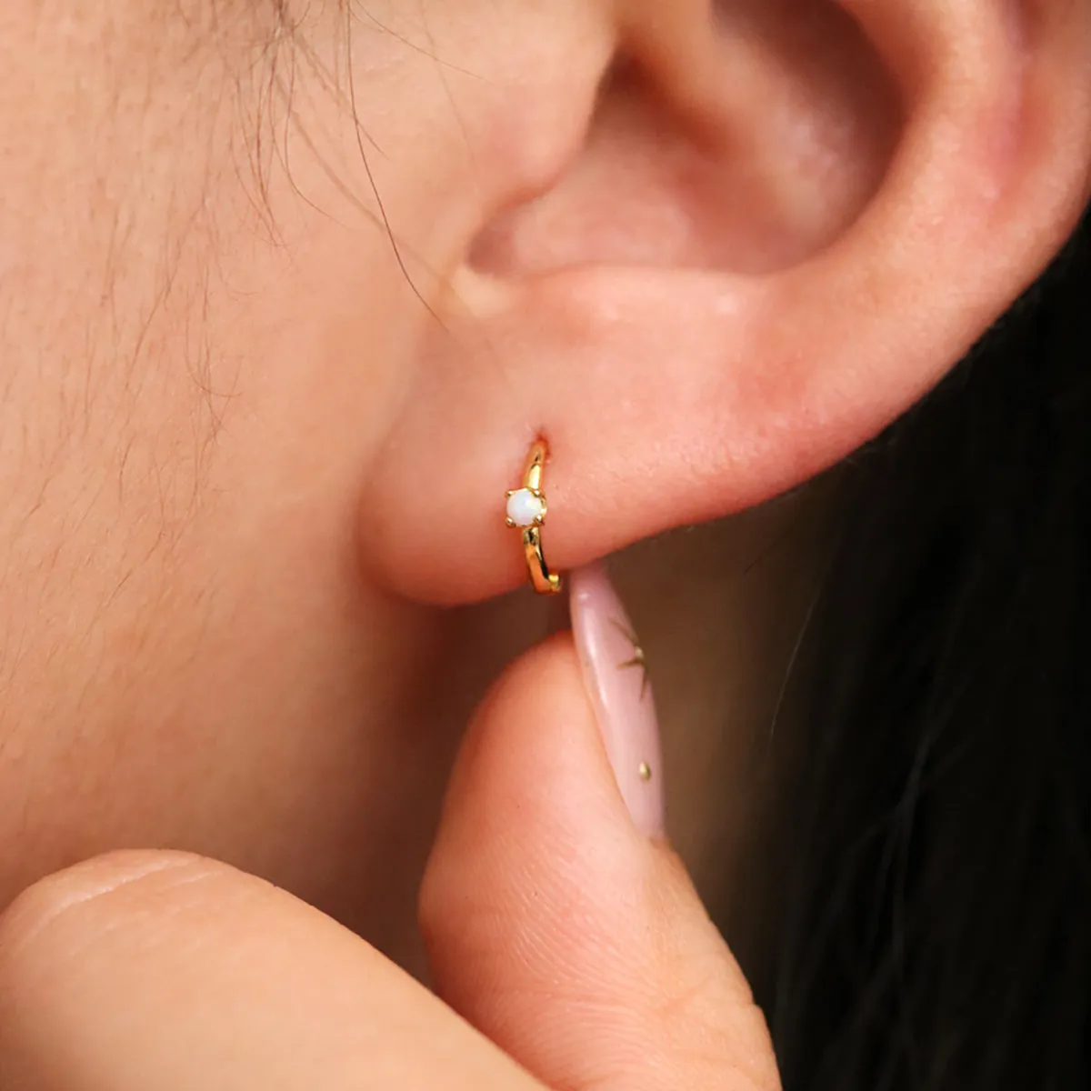 Opal Slim Huggie Earring sold by NABI LONDON product image thumbnail 2