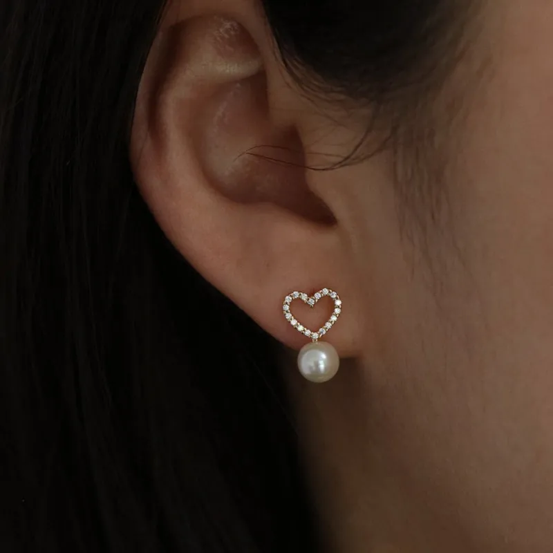 Heart pearl drop earrings sold by NABI LONDON