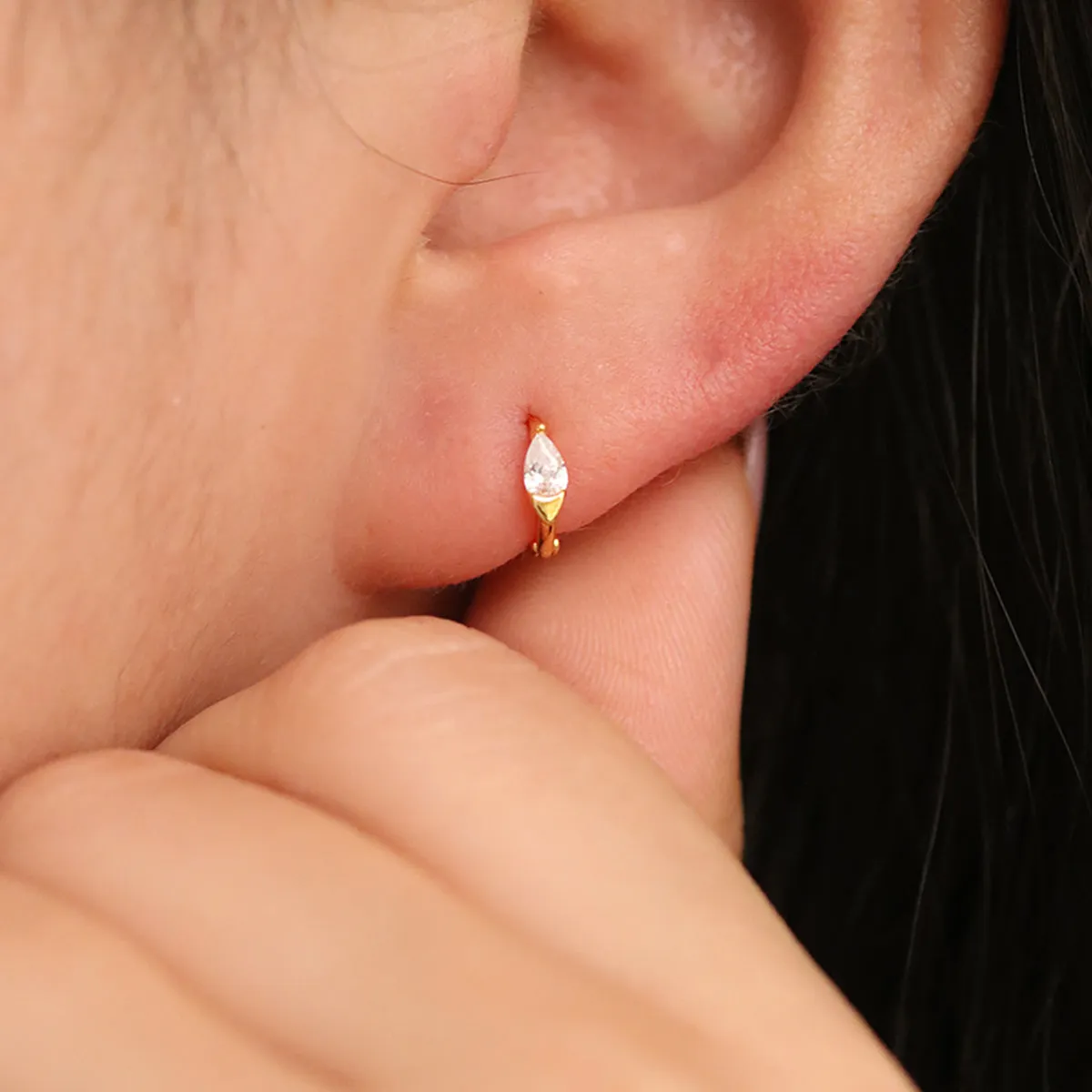 Teardrop Cubic Huggie Earring sold by NABI LONDON product image thumbnail 3