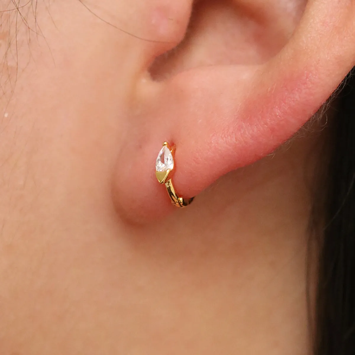 Teardrop Cubic Huggie Earring sold by NABI LONDON product image thumbnail 4
