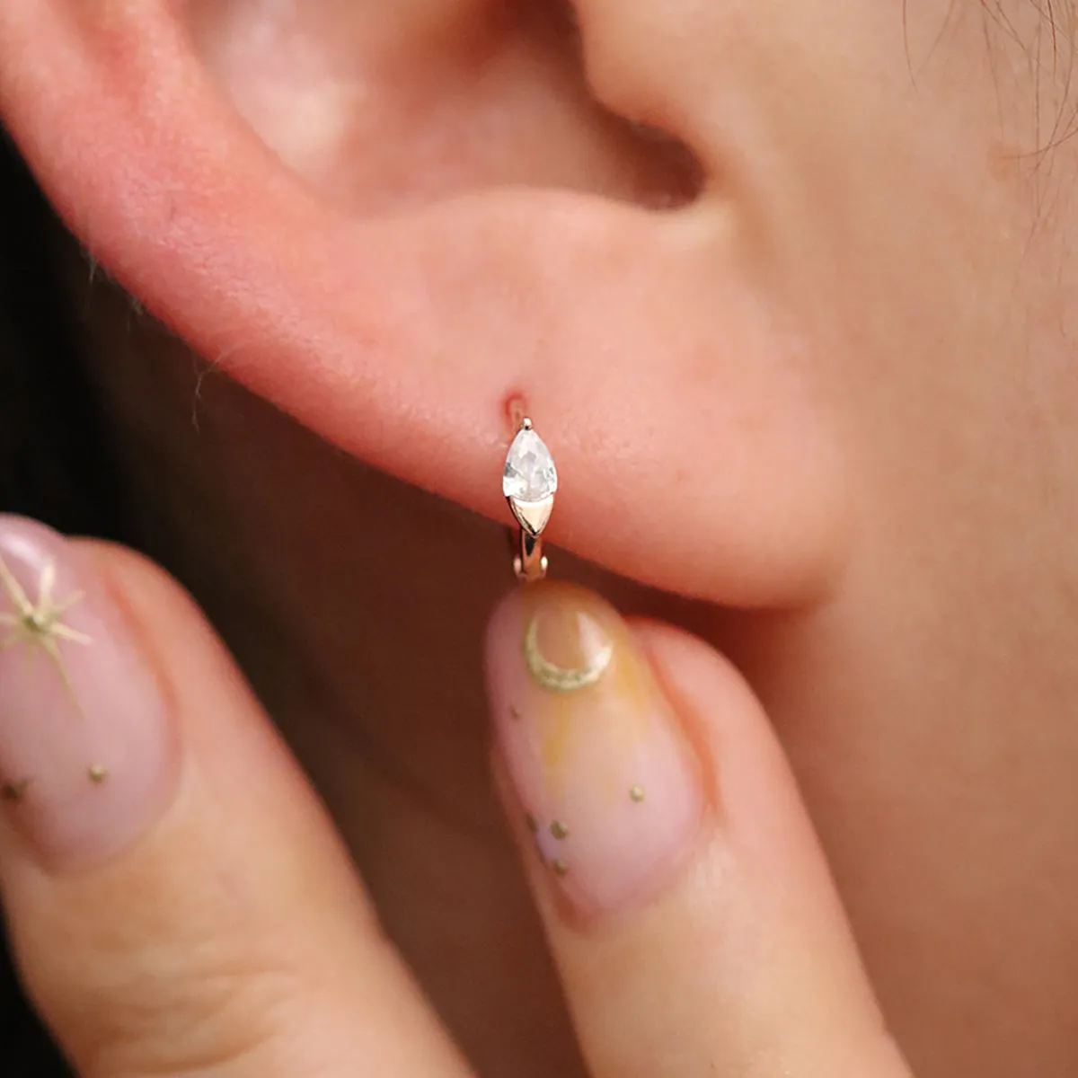 Teardrop Cubic Huggie Earring sold by NABI LONDON product image thumbnail 2