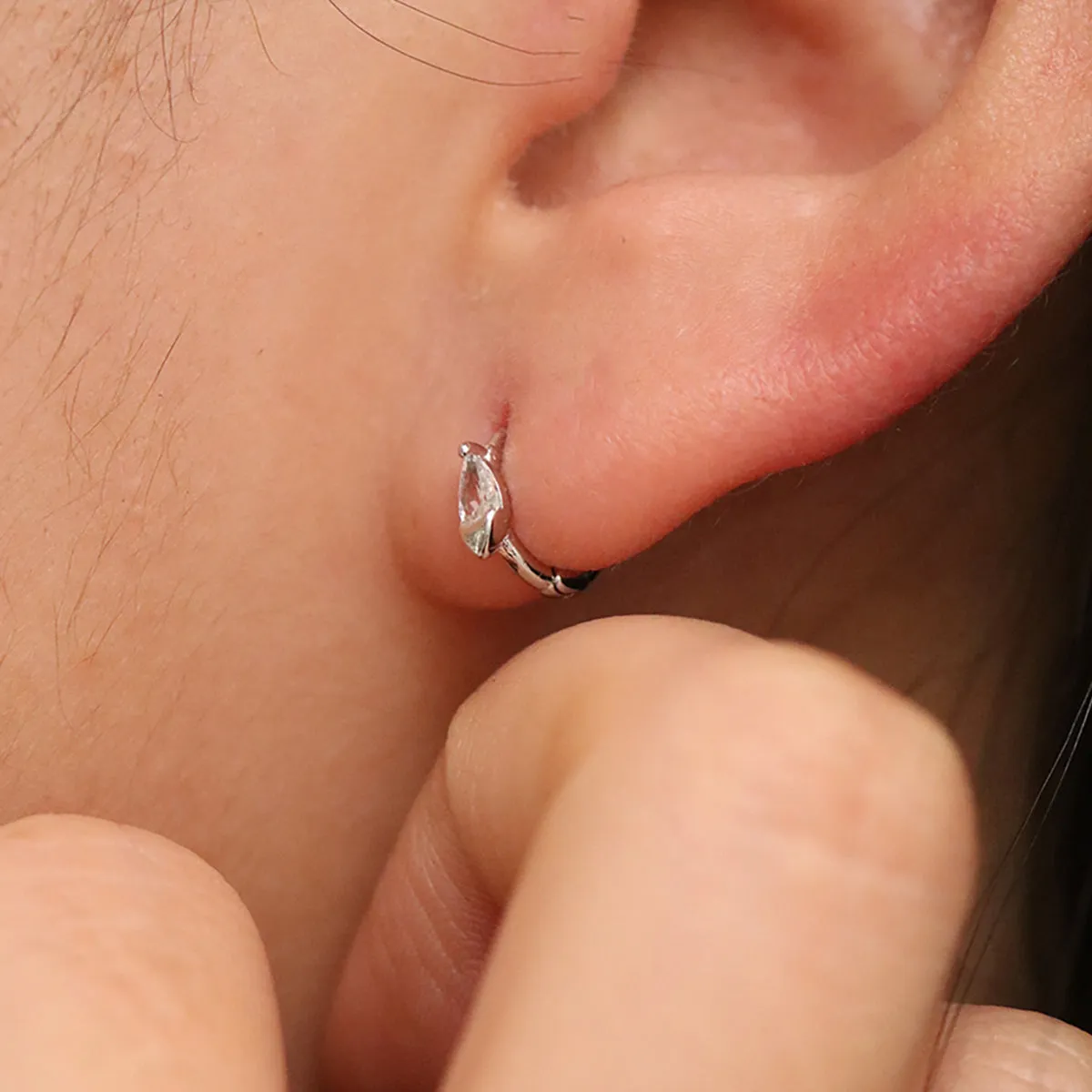 Teardrop Cubic Huggie Earring sold by NABI LONDON product image thumbnail 5