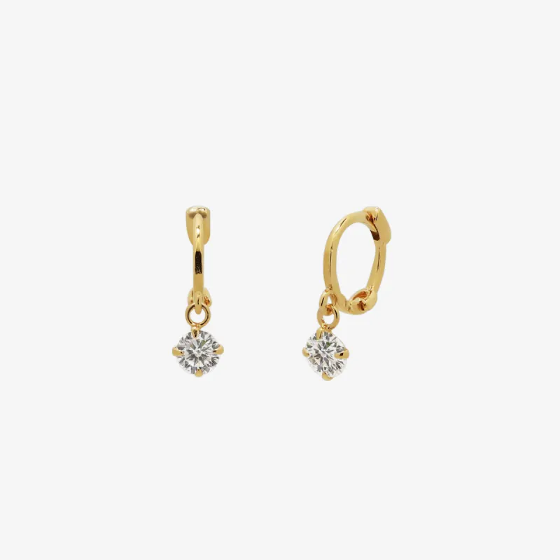 Cubic Charm Huggie Earring sold by NABI LONDON