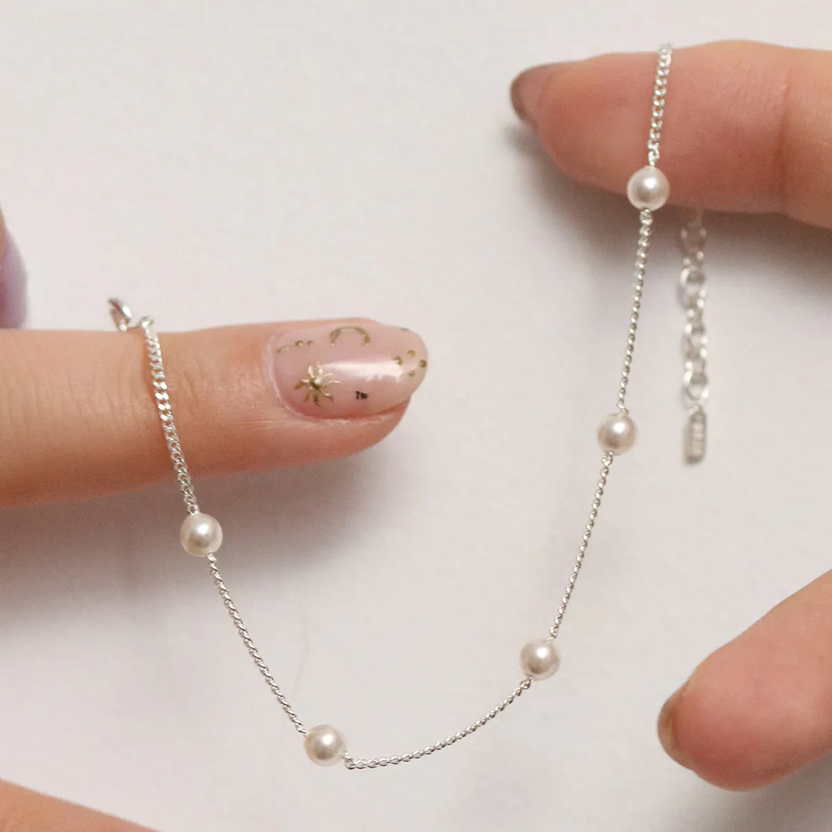 Five pearl relayed bracelet sold by NABI LONDON product image thumbnail 3