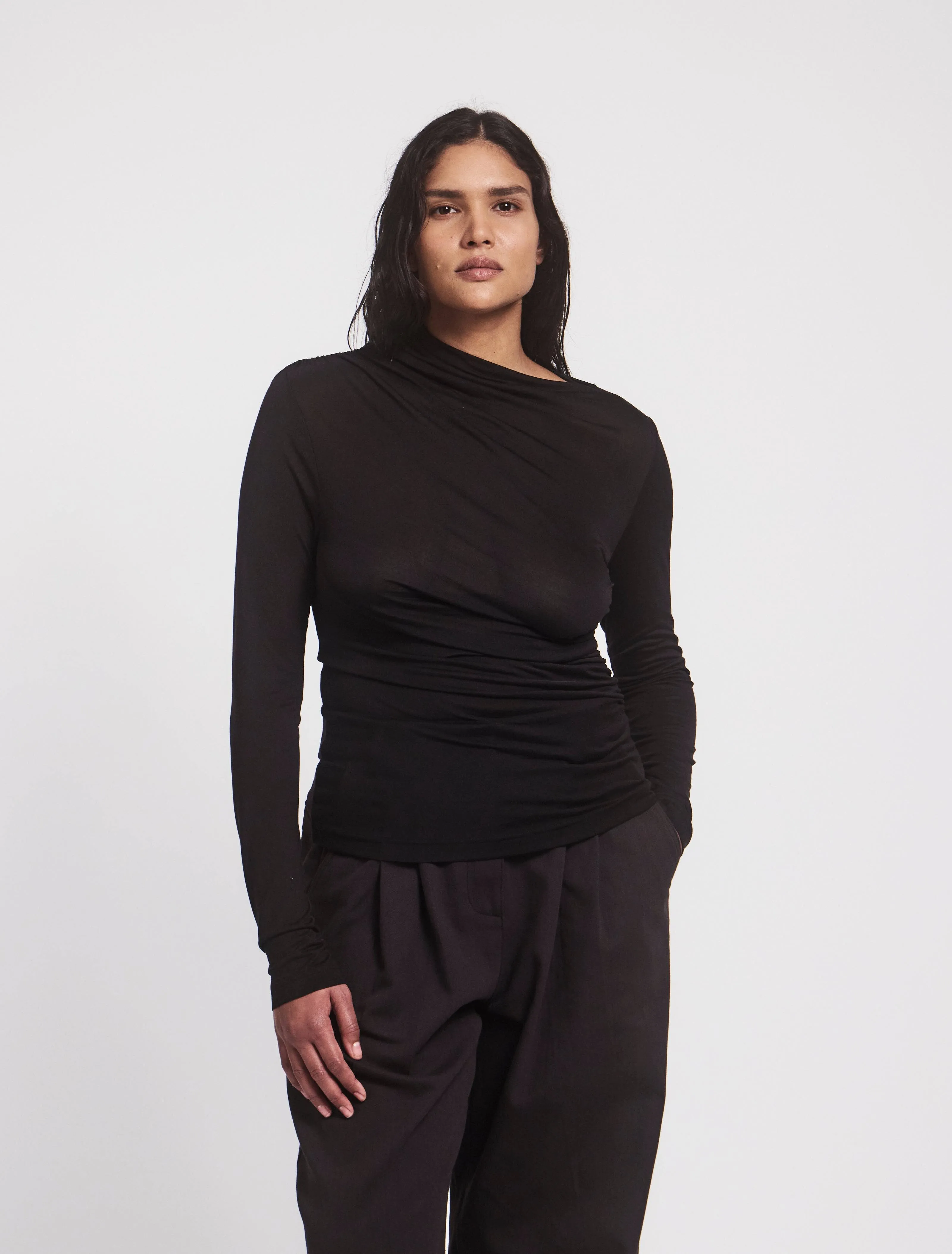 Iphis Draped Long Sleeve Top in Black sold by Ninety Percent