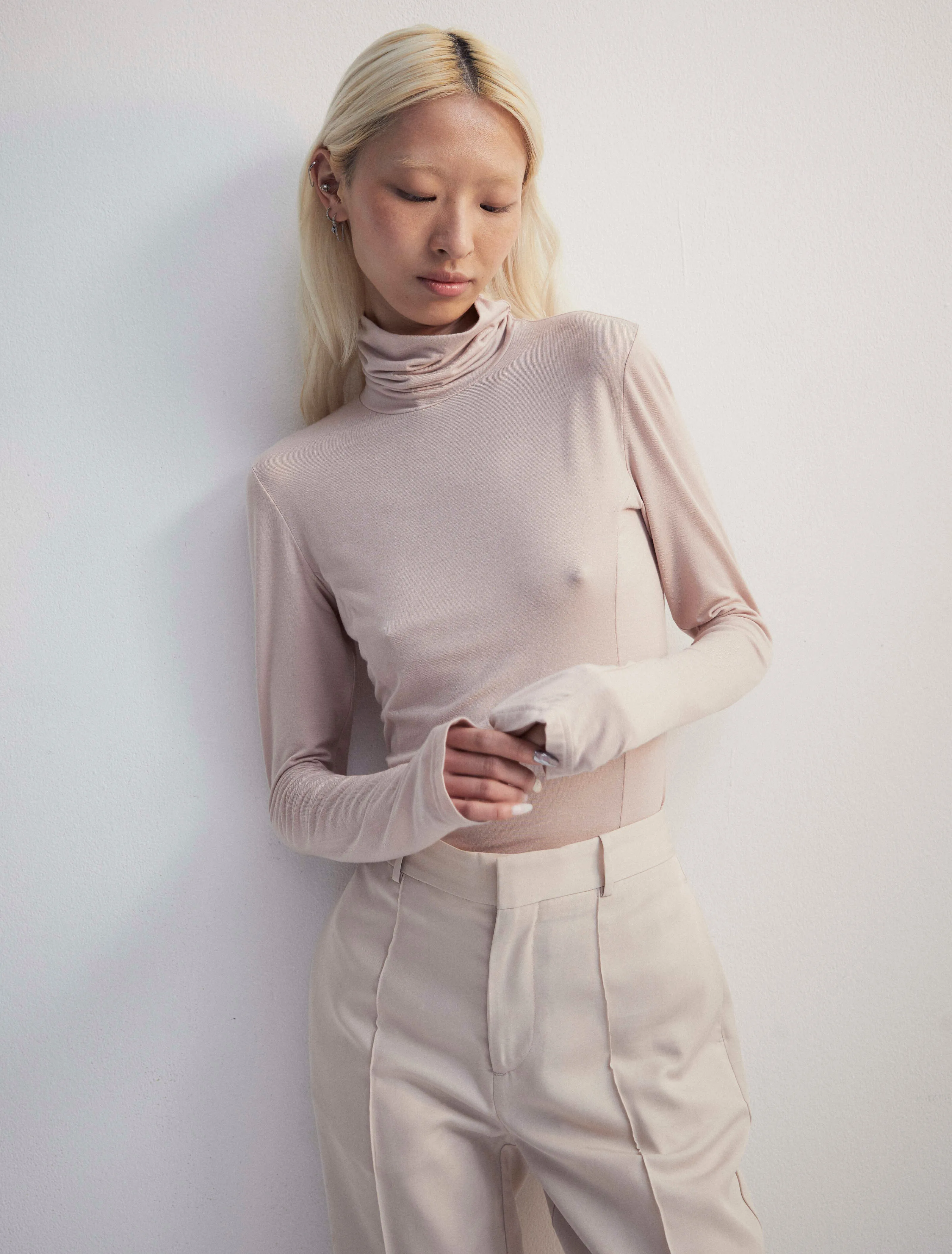 Ellon Turtleneck in Jasmine sold by Ninety Percent