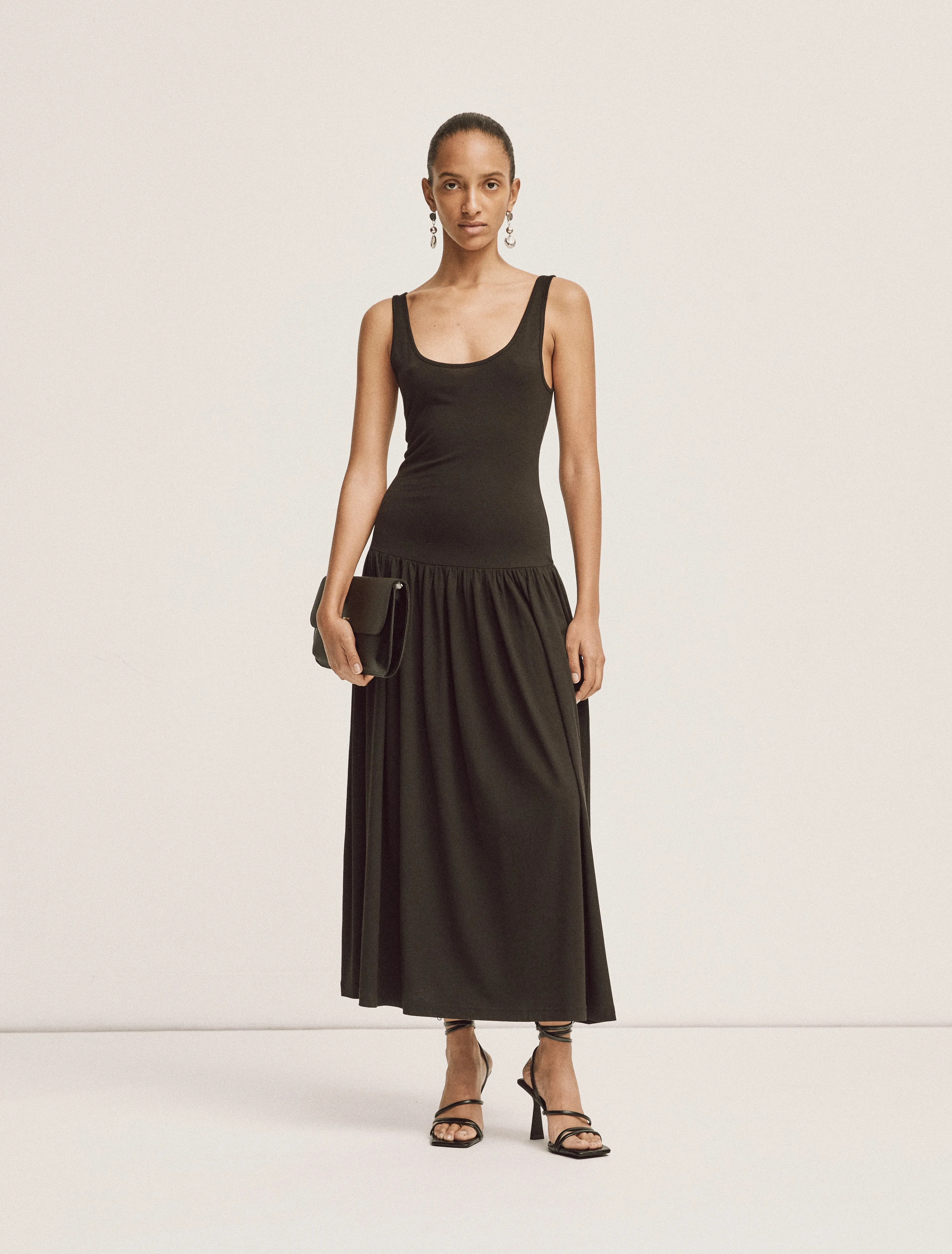 Flos Dress in Black sold by Ninety Percent