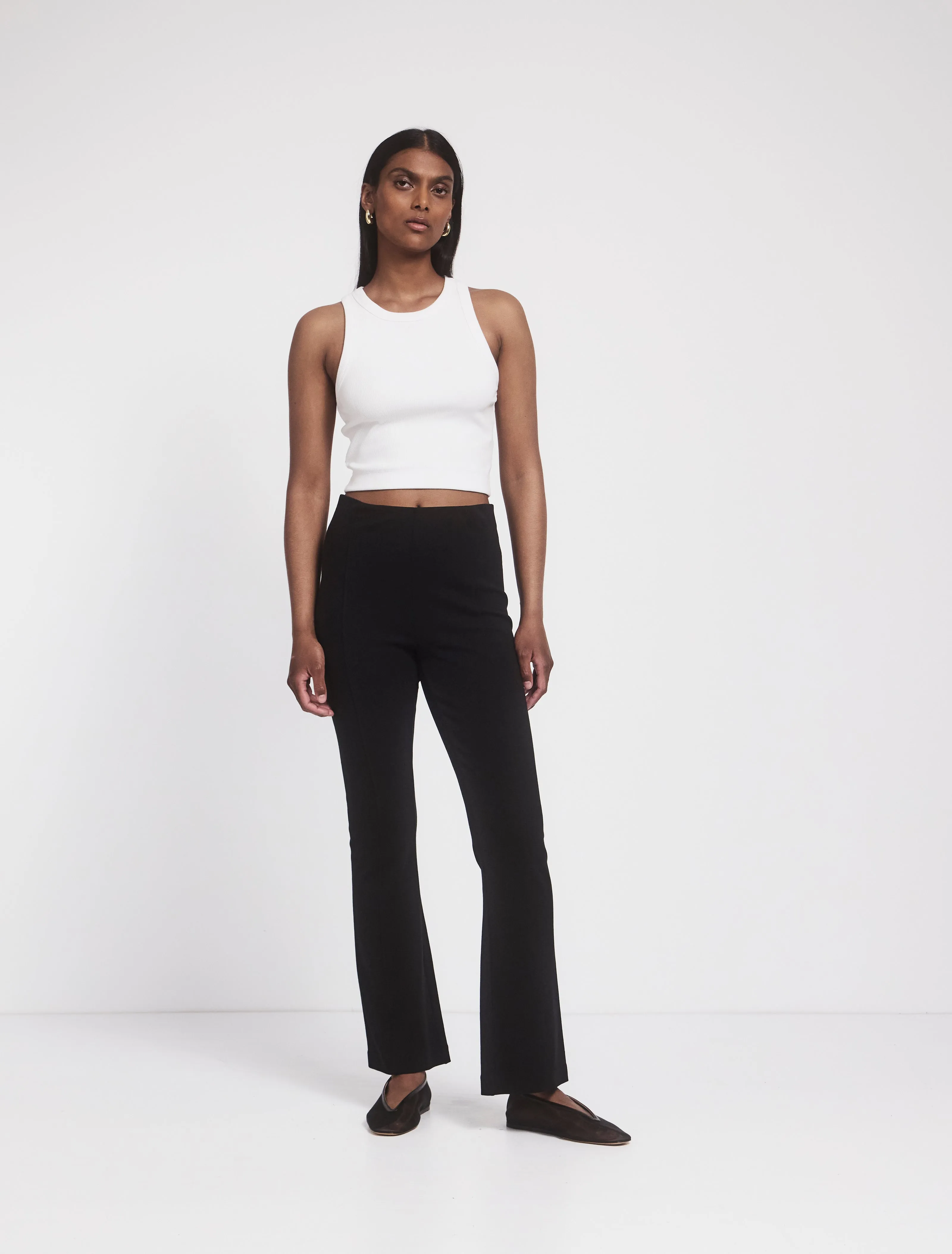 Crop Flare Travel Pant in Black sold by Ninety Percent