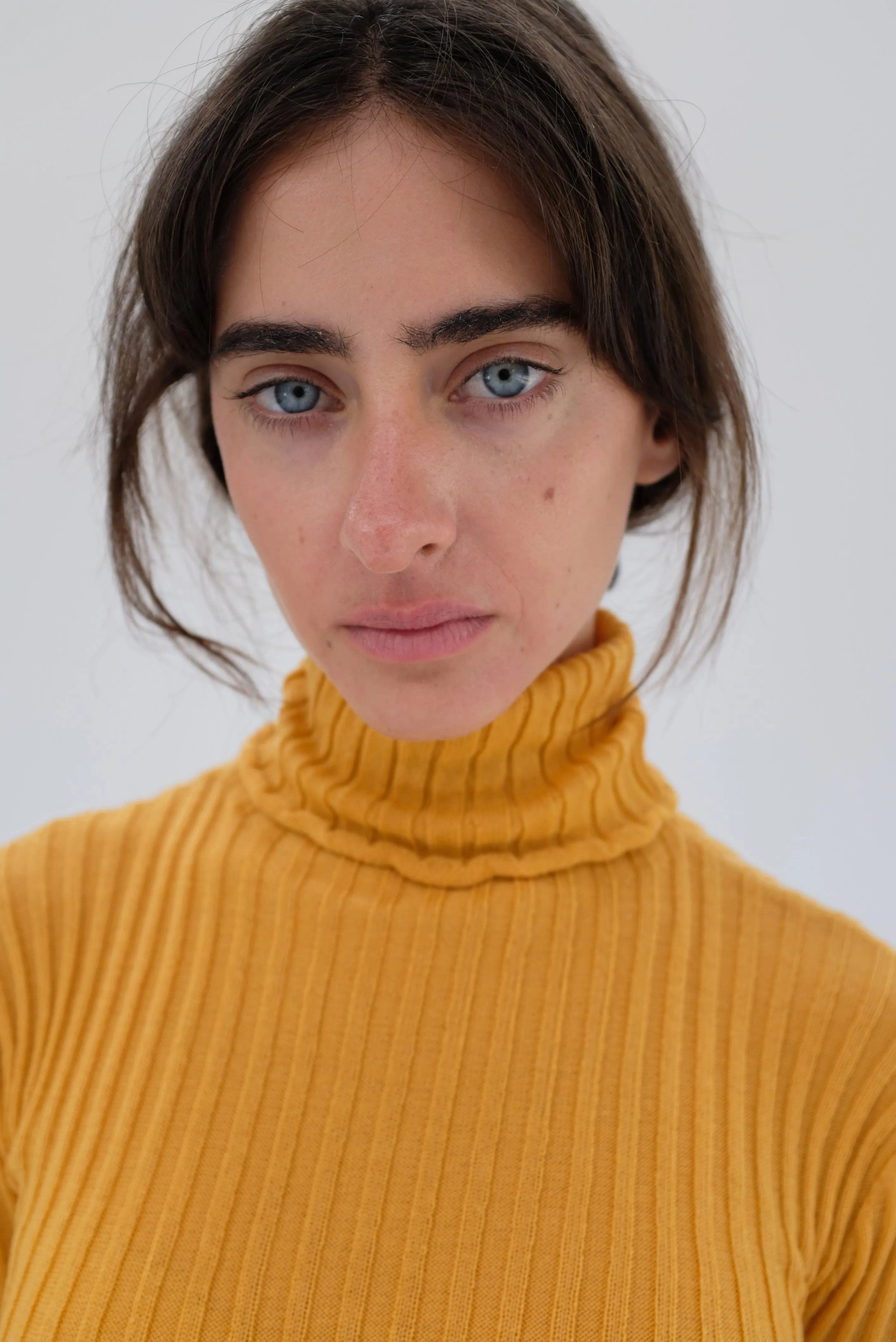 Beklina Merino Ribbed Turtleneck Saffron sold by Beklina